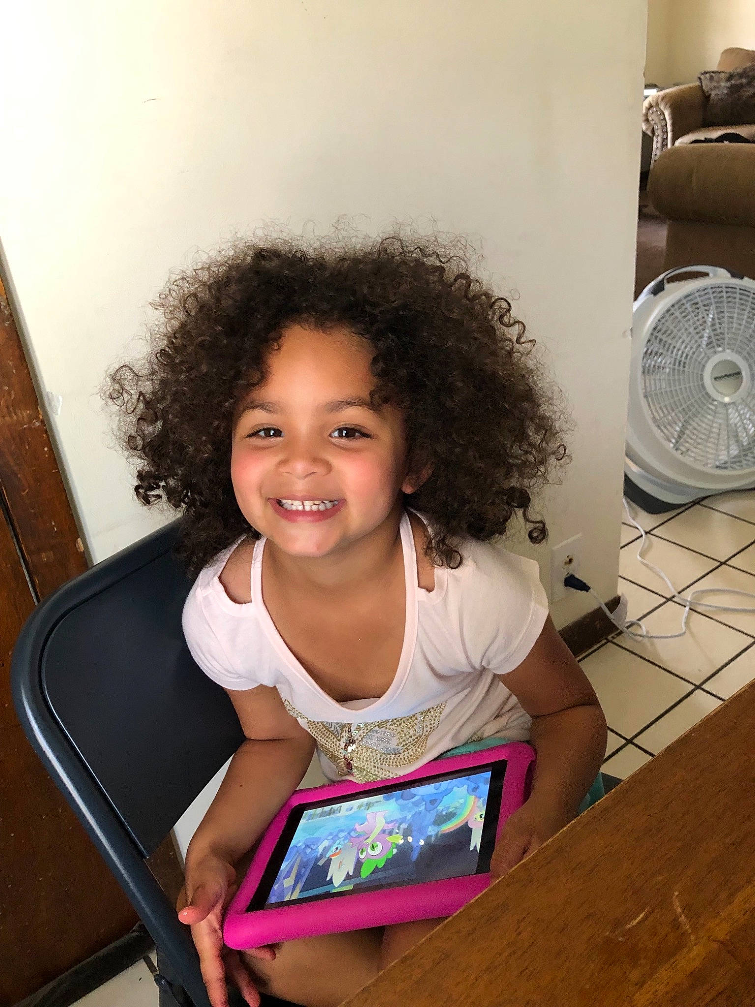 Lia joined the competition — help win amazing prizes! child, electronic_device, hair, hairstyle, joy, person, sitting, smile, technology, toddler