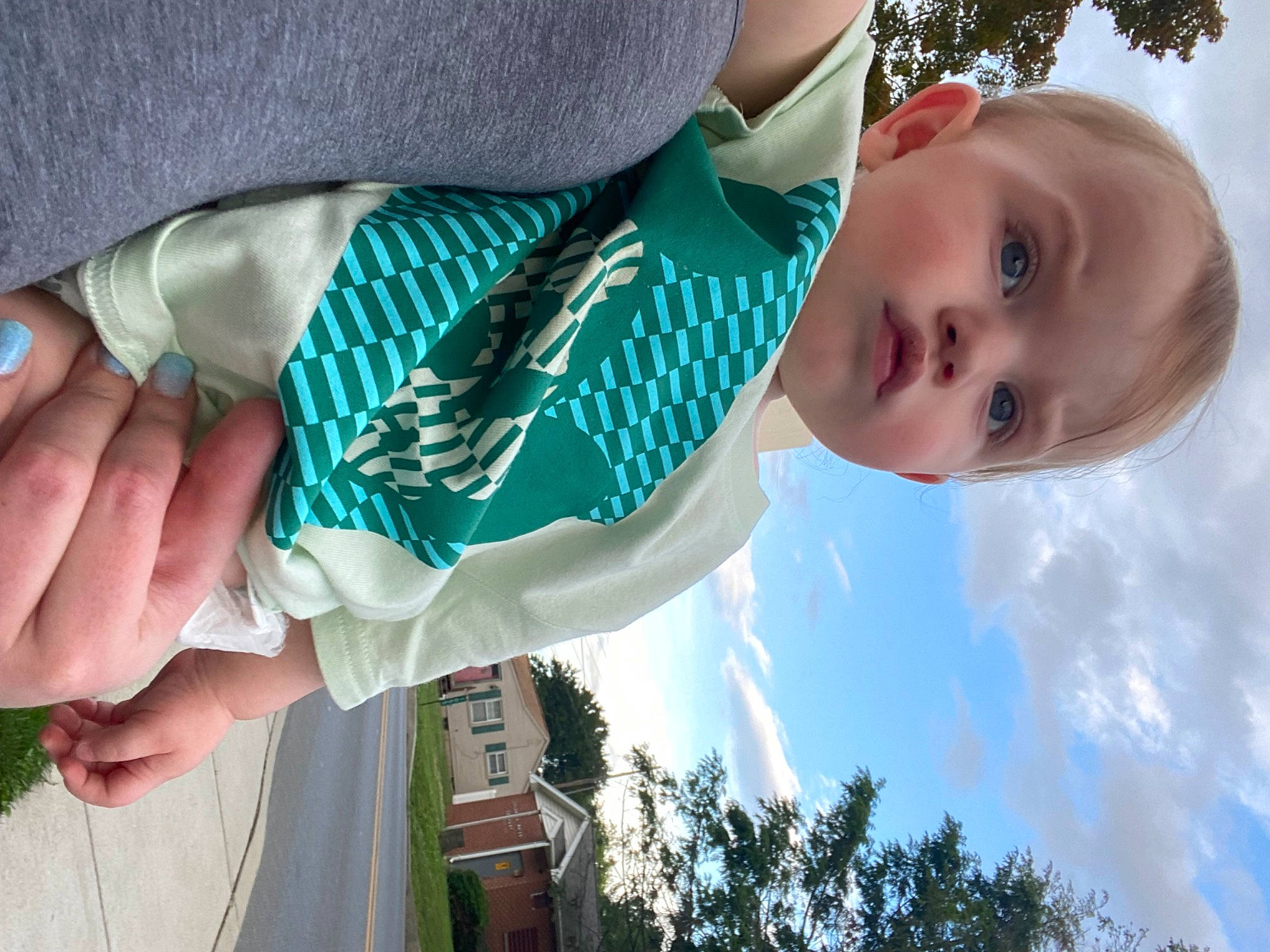 Christian is registered to the contest to win money with this photo: baby, baby_toddler_clothing, child, cloud, electric_blue, finger, fun, gesture, grass, green, hand, happy, nail, people_in_nature, person, sky, thumb, toddler, tree, window