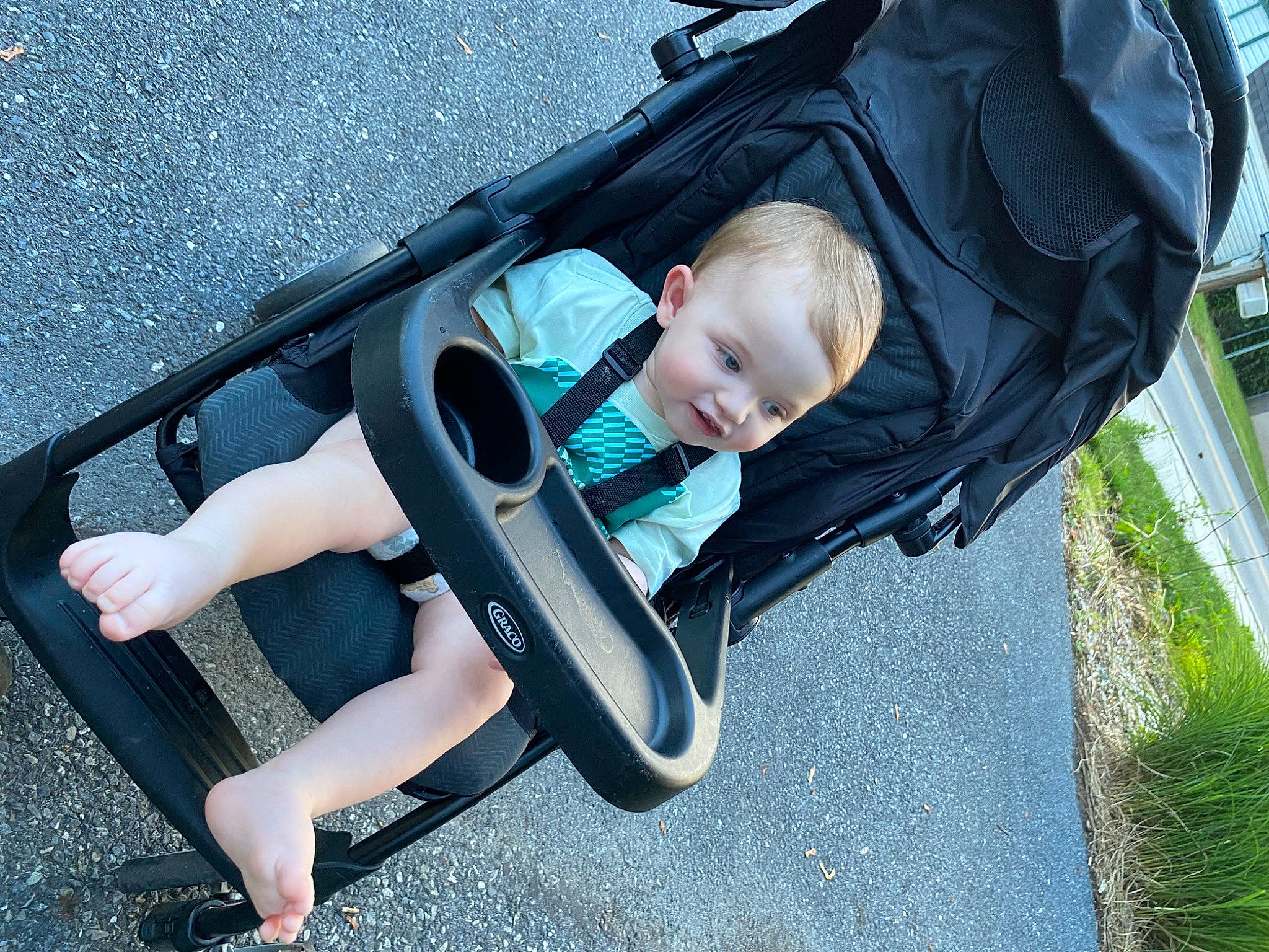 Christian joined the competition — help win amazing prizes! baby, baby_carriage, baby_products, child, comfort, foot, fun, grass, human_body, human_leg, leisure, people_in_nature, person, personal_protective_equipment, plant, recreation, sitting, thigh, toddler, tree