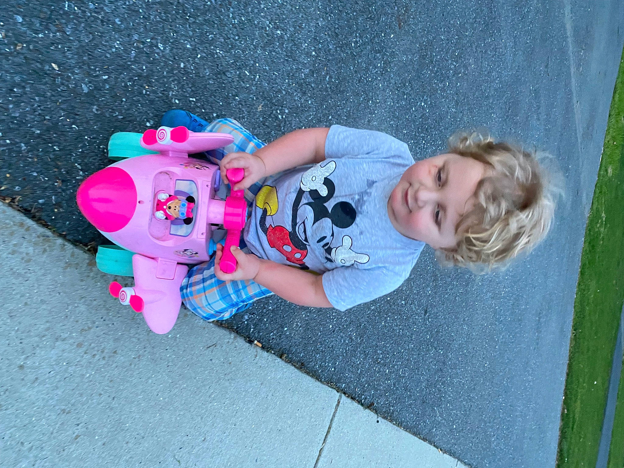 Aiyrian is registered to the contest to win money with this photo: asphalt, baby, baby_products, baby_toddler_clothing, baby_toys, carmine, child, electric_blue, fun, grass, happy, leisure, magenta, person, plant, plastic, play, recreation, smile, toddler