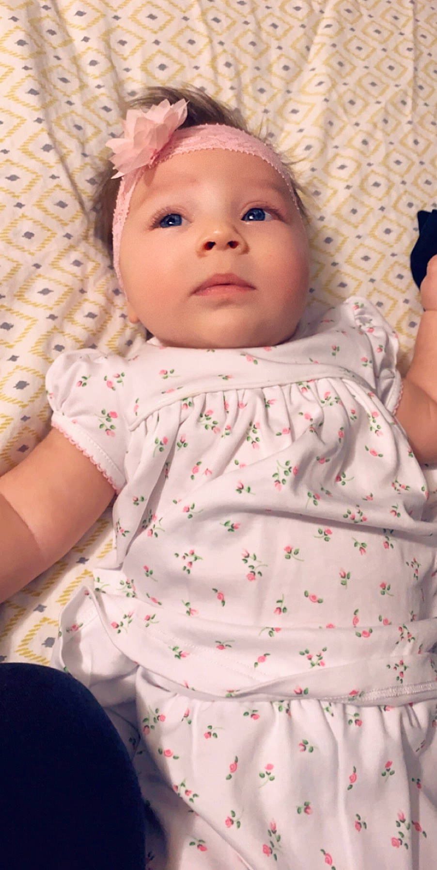 Rhea is registered to the contest to win money with this photo: baby, cheek, child, face, forehead, head, lip, nose, pattern, person, pink, skin, toddler