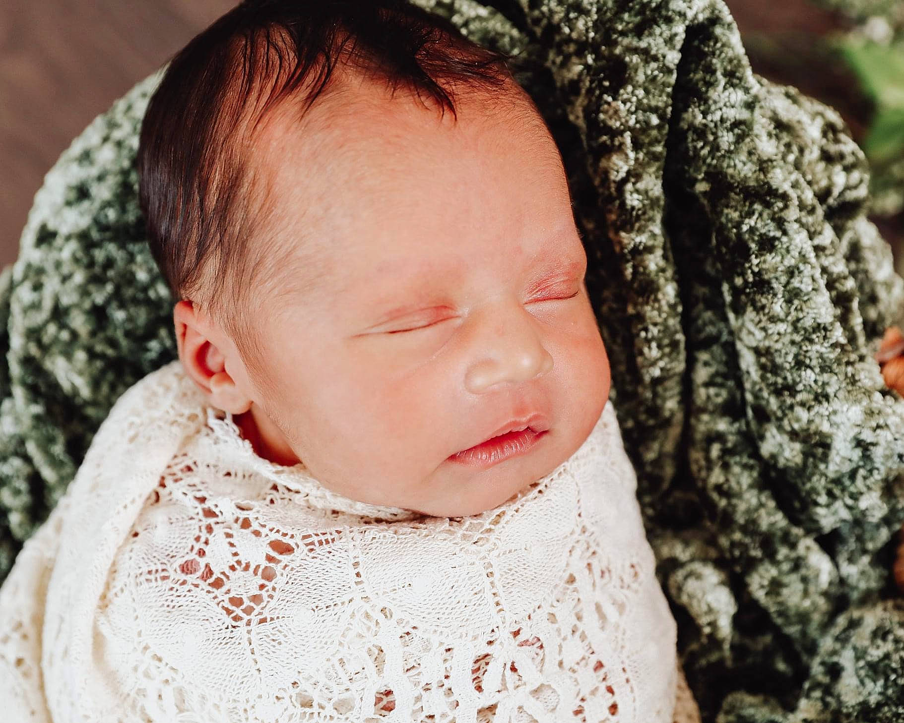 London is registered to the contest to win money with this photo: baby, baby_toddler_clothing, cheek, chin, collar, comfort, eye, eyebrow, eyelash, face, grass, happy, head, iris, lip, neck, nose, person, skin, sleeve