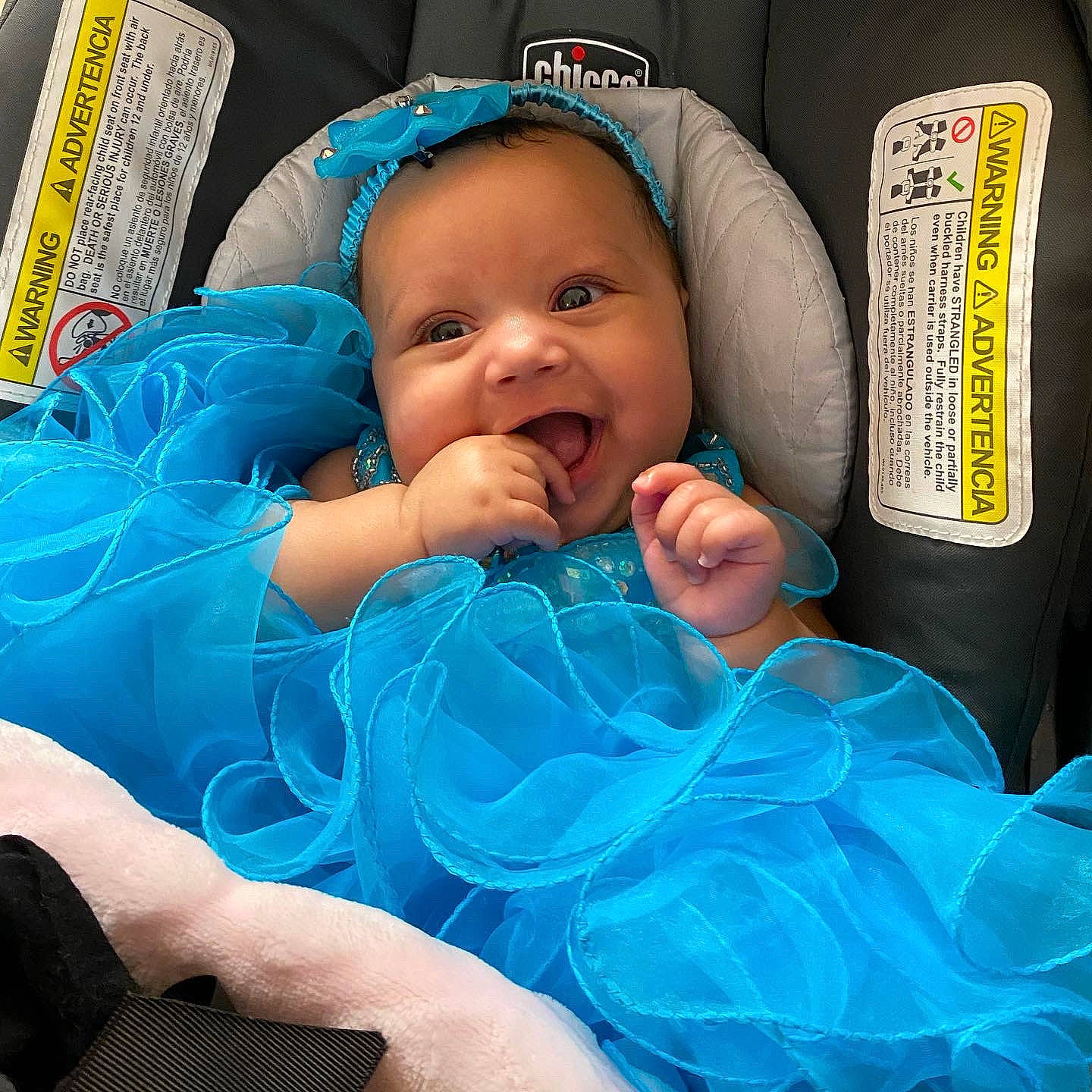 London is registered to the contest to win money with this photo: baby, baby_safety, baby_sleeping, baby_toddler_clothing, blue, cheek, cloud, comfort, eyebrow, face, finger, happy, head, iris, linens, mouth, person, product, smile, thumb