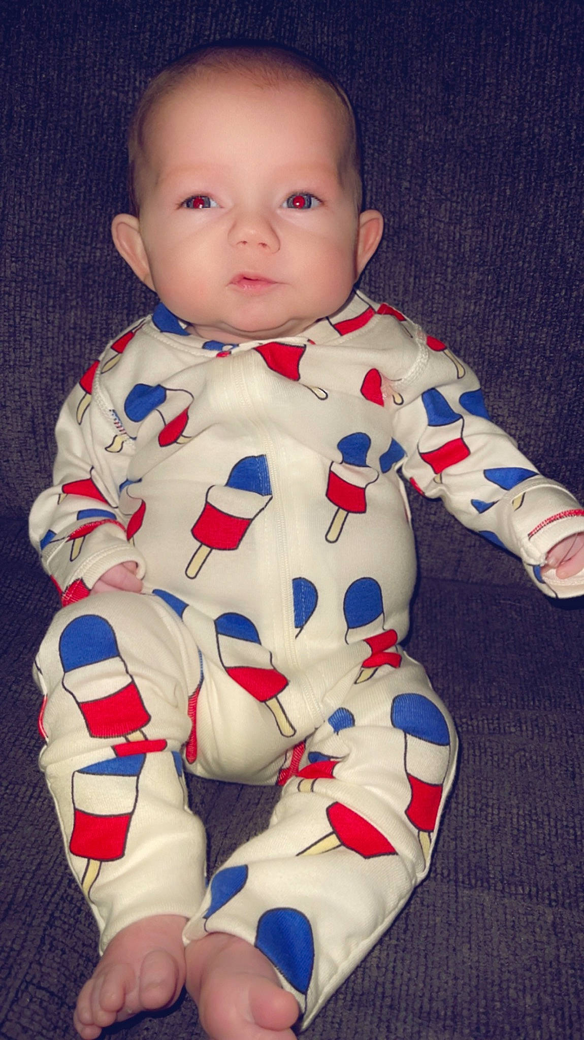 Kai is registered to the contest to win money with this photo: baby, baby_toddler_clothing, carmine, cheek, child, collar, electric_blue, eye, finger, happy, head, nose, outerwear, pattern, person, skin, sleeve, textile, thumb, toddler