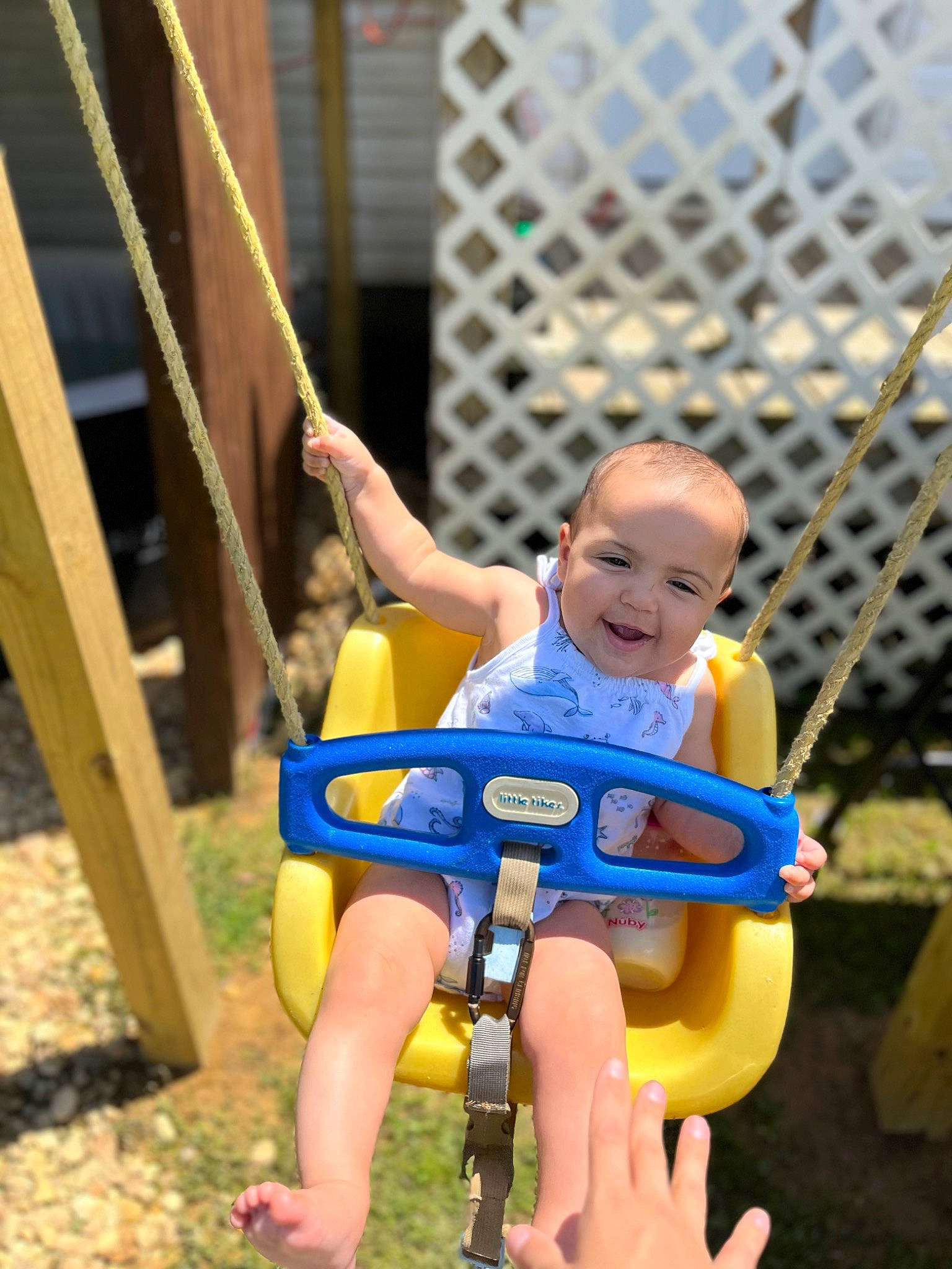 Karsyn joined the competition — help win amazing prizes! baby_products, baby_toddler_clothing, baby_toys, child, city, electric_blue, face, fence, fun, happy, joy, leisure, person, plastic, play, recreation, sitting, smile, summer, toddler