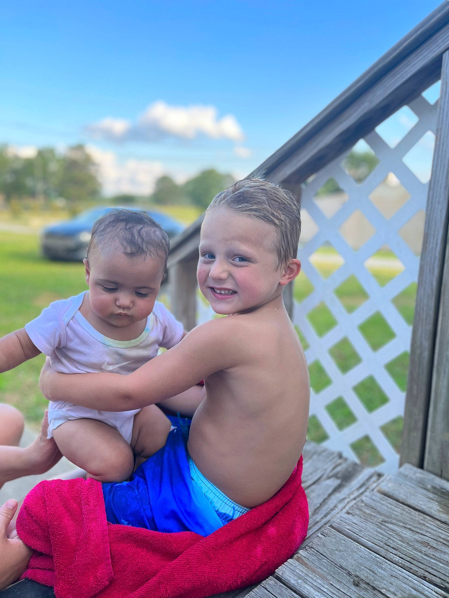 Karsyn joined the competition — help win amazing prizes! abdomen, azure, baby, baby_toddler_clothing, barefoot, child, cloud, event, fun, grass, happy, joy, leisure, person, recreation, sandal, shoulder, sitting, sky, smile