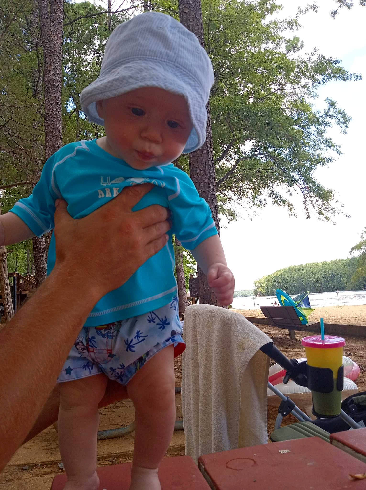 Braden is registered to the contest to win money with this photo: baby, baby_toddler_clothing, cap, electric_blue, fun, grass, happy, hat, headwear, leisure, outdoor_furniture, person, pink, plant, public_space, recreation, shorts, sky, summer, toddler