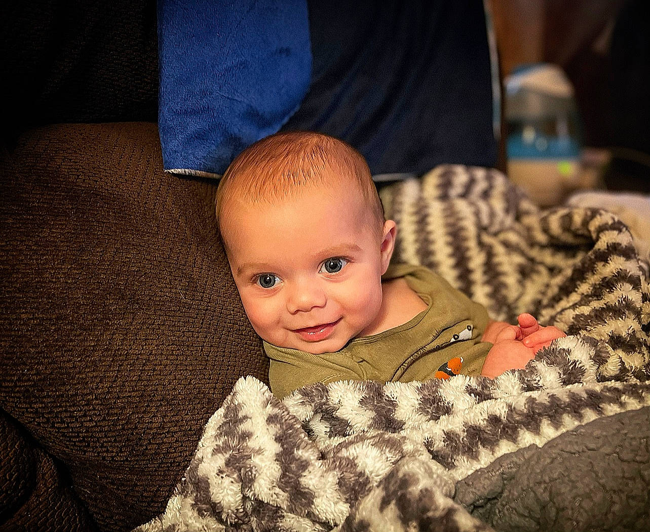 Damon joined the competition — help win amazing prizes! baby, baby_toddler_clothing, cheek, comfort, cool, eye, flash_photography, flooring, happy, head, human_body, iris, joy, military_camouflage, nose, person, sitting, skin, sleeve, smile