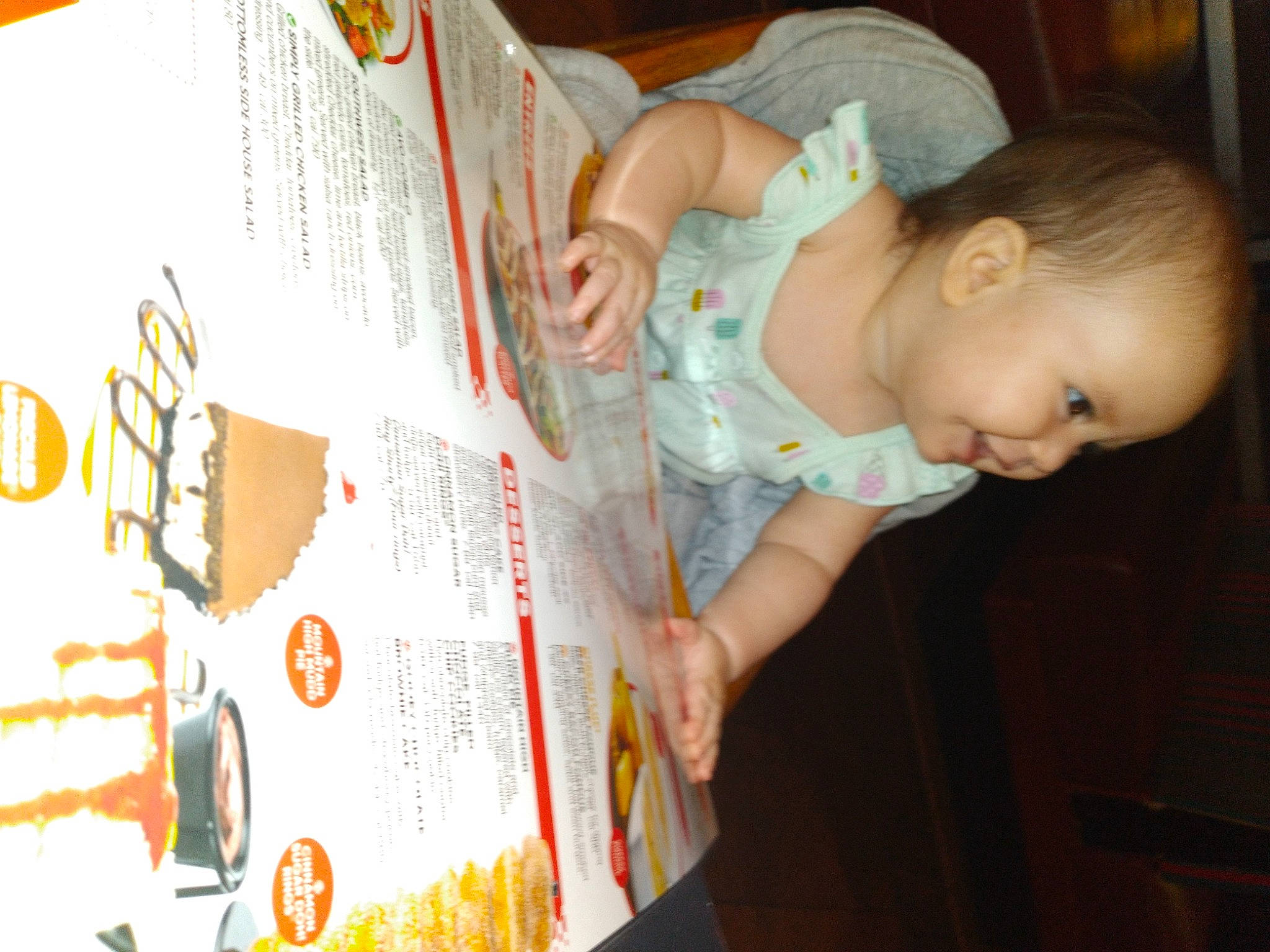 Leanna joined the competition — help win amazing prizes! art, baby, baby_products, baby_toddler_clothing, child, comfort, font, fun, paper, pattern, person, publication, reading, room, sitting, t_shirt, toddler, visual_arts, wood, writing