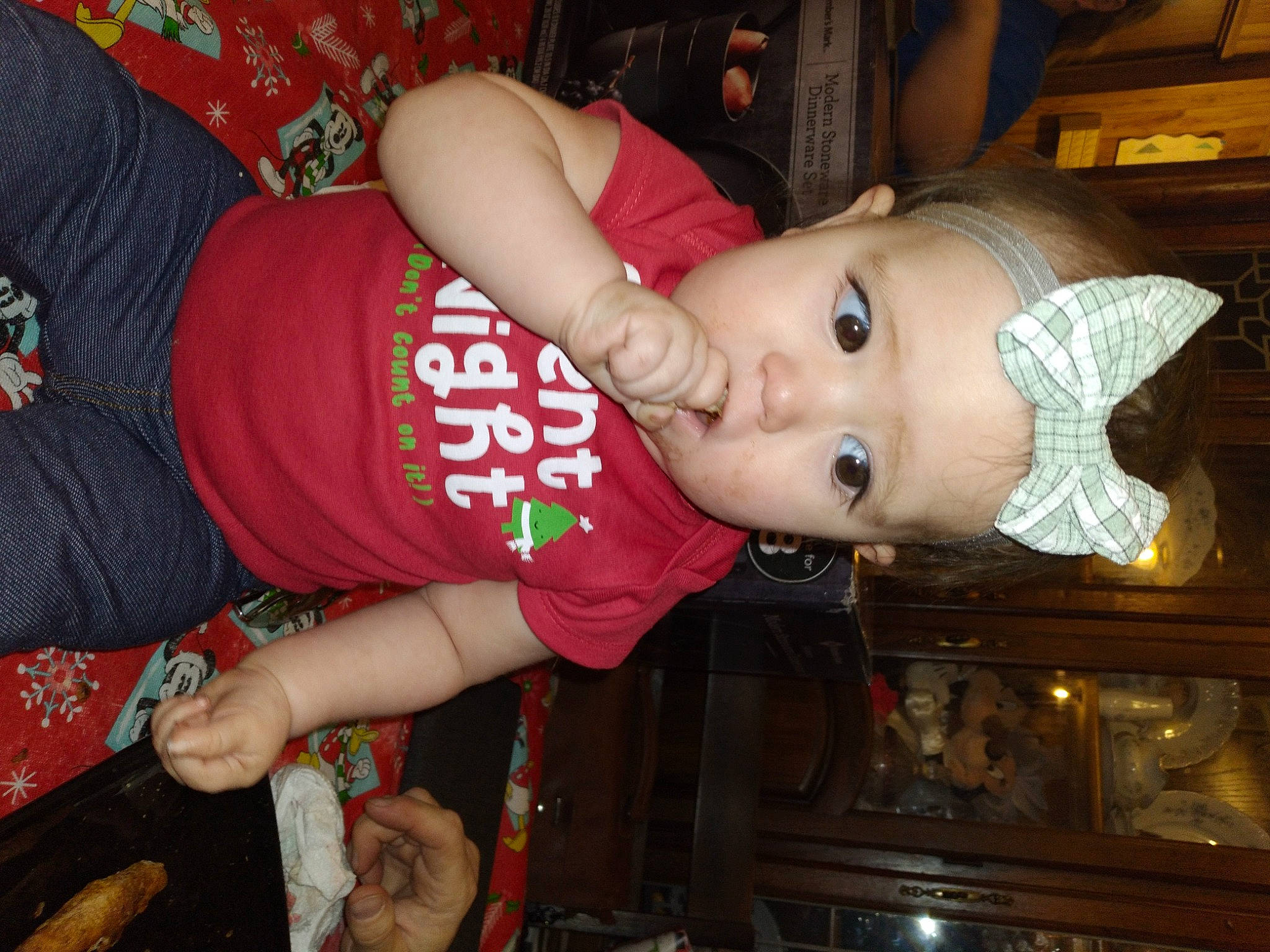 Leanna joined the competition — help win amazing prizes! baby, baby_toddler_clothing, cheek, chest, child, elbow, fun, human_leg, mouth, pattern, person, sitting, sleeve, t_shirt, thigh, toddler, wood, wrist