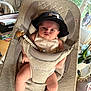 Eloann a rejoint le concours — aidez-le/la à gagner de superbes lots ! baby, cap, ergobaby, beads, indoor, dog, chair, harness, person, face, legs, plant, window, door, table, light, furniture, pet, expression, clothing