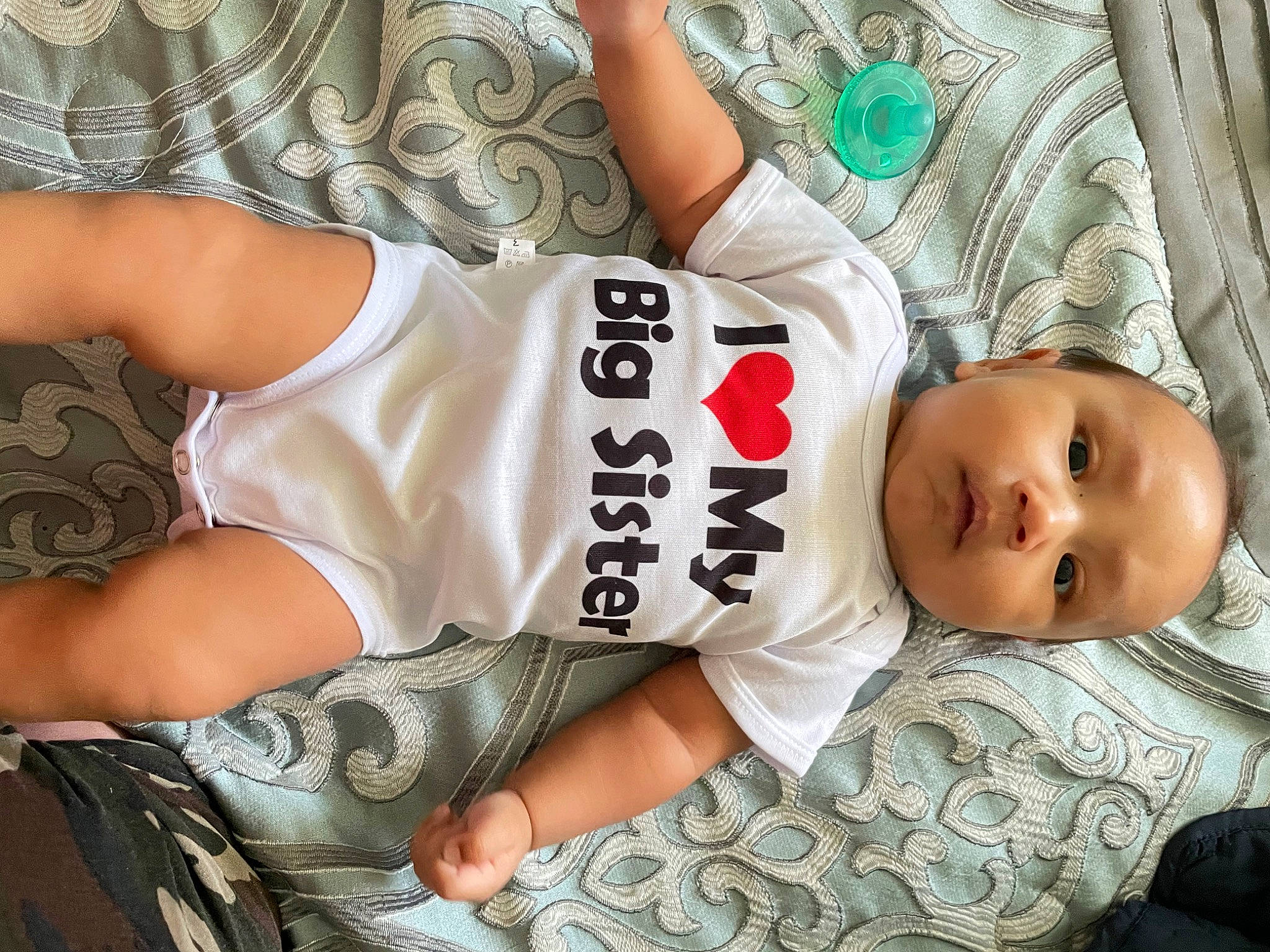 Kyrie joined the competition — help win amazing prizes! arm, baby_toddler_clothing, black_hair, cheek, child, chin, comfort, cool, elbow, facial_expression, finger, hairstyle, happy, head, human_body, neck, person, skin, sleeve, thigh