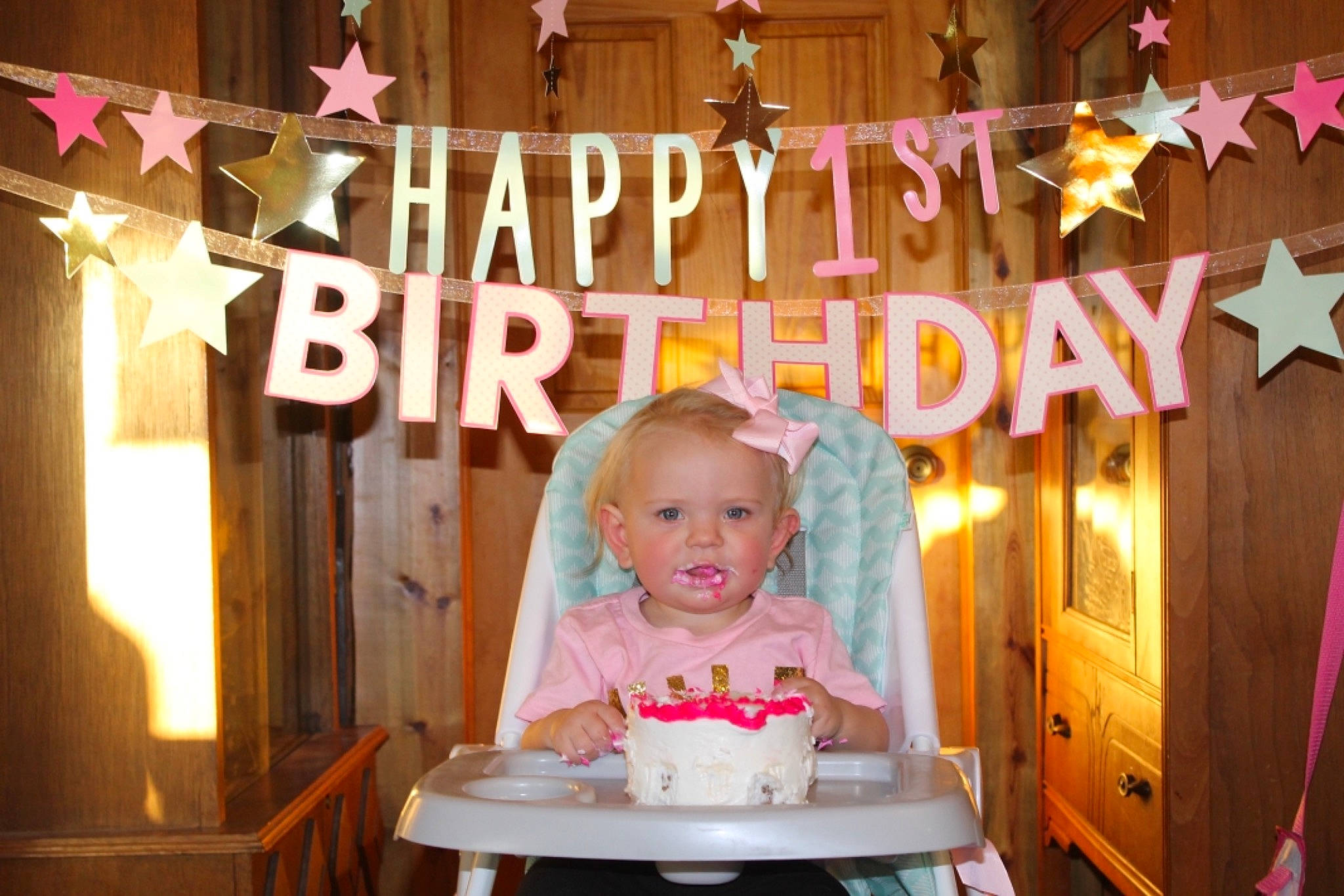Kynzlee is registered to the contest to win money with this photo: baby, baby_toddler_clothing, baked_goods, baking, birthday, birthday_cake, cake, cake_decorating, dairy, decoration, dessert, pastry, peach, person, pink, serveware, sugar_cake, sweetness, window_treatment