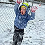 Carter joined the competition — help win amazing prizes! child, snow, winter, playing, outdoor, jacket, hat, gloves, boots, fence, snowflakes, happy, cold, fun, clothing, expression, snowball, grass, person, activity
