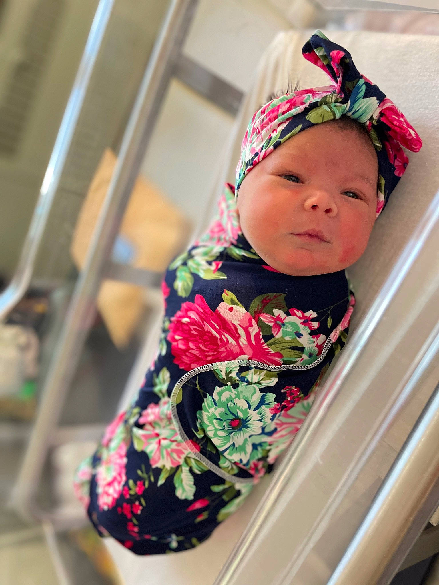 Angelina joined the competition — help win amazing prizes! baby, baby_toddler_clothing, beanie, cap, child, eye, fashion_accessory, flower, fun, hair_accessory, happy, headgear, headwear, magenta, pattern, peach, person, skin, sleeve, street_fashion