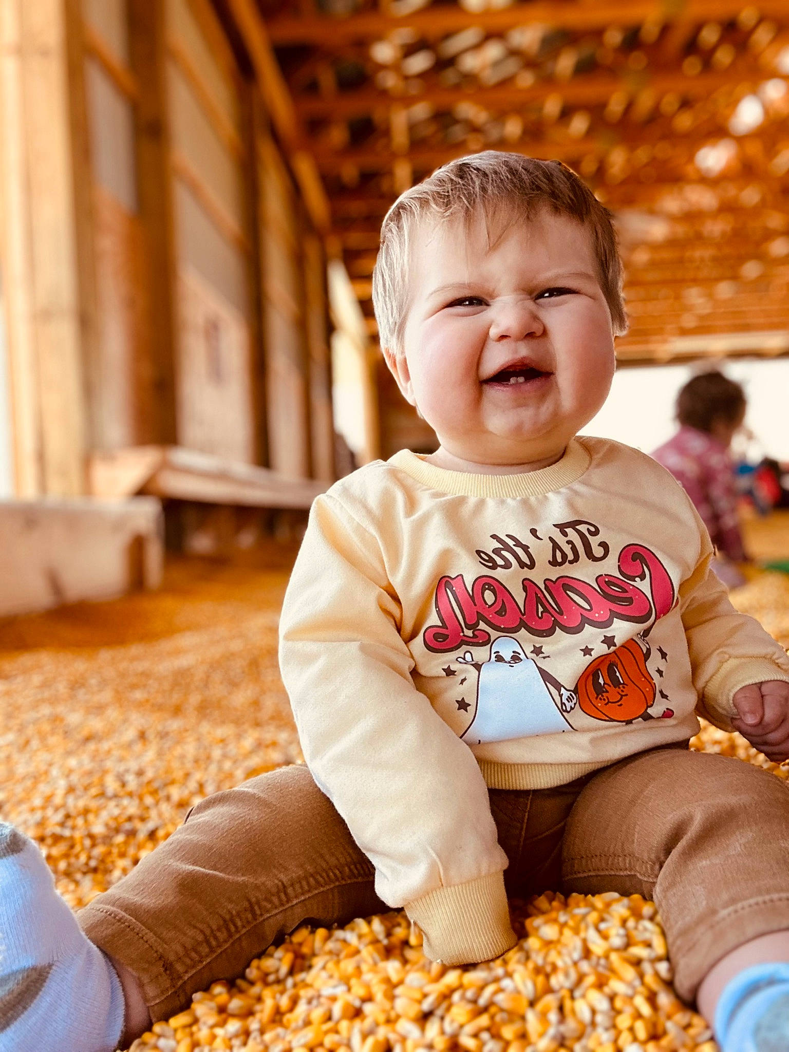 Rowan joined the competition — help win amazing prizes! baby, baby_playing_with_toys, baby_toddler_clothing, child, facial_expression, flooring, fun, happy, leisure, orange, people_in_nature, person, play, portrait_photography, sitting, skin, sleeve, smile, t_shirt, toddler