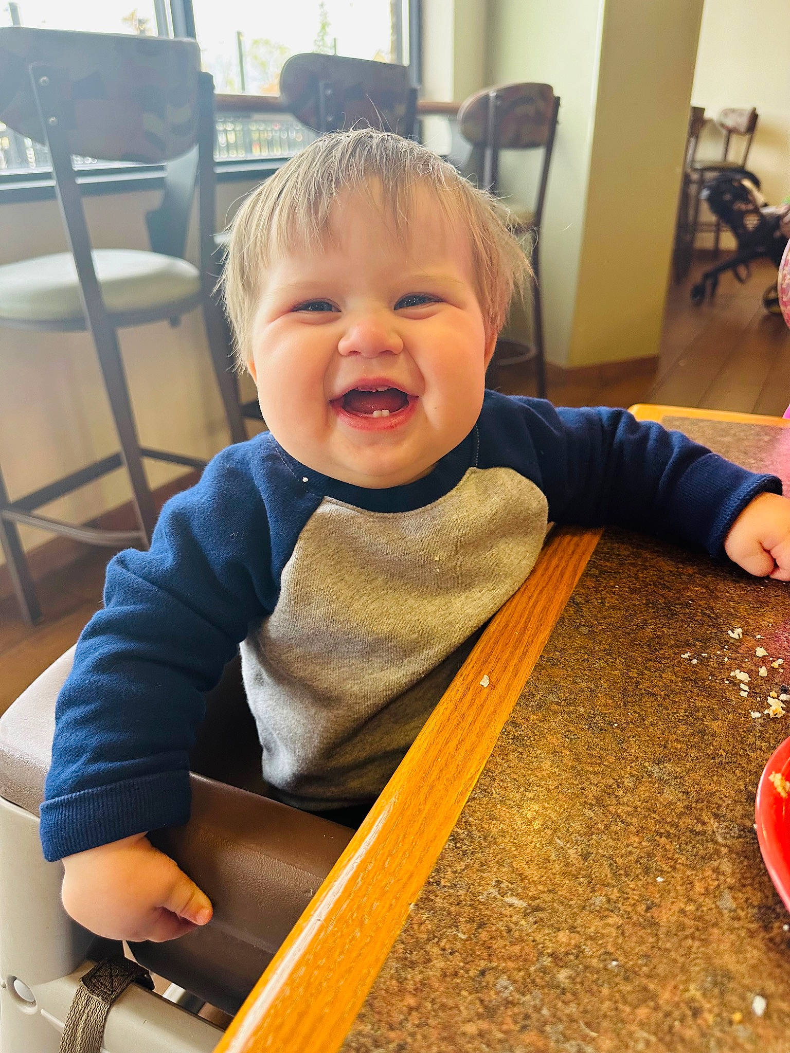 Rowan joined the competition — help win amazing prizes! baby, baby_playing_with_toys, baby_products, baby_safety, baby_toddler_clothing, chair, child, facial_expression, flooring, fun, furniture, person, room, sitting, sleeve, smile, standing, tableware, toddler, varnish