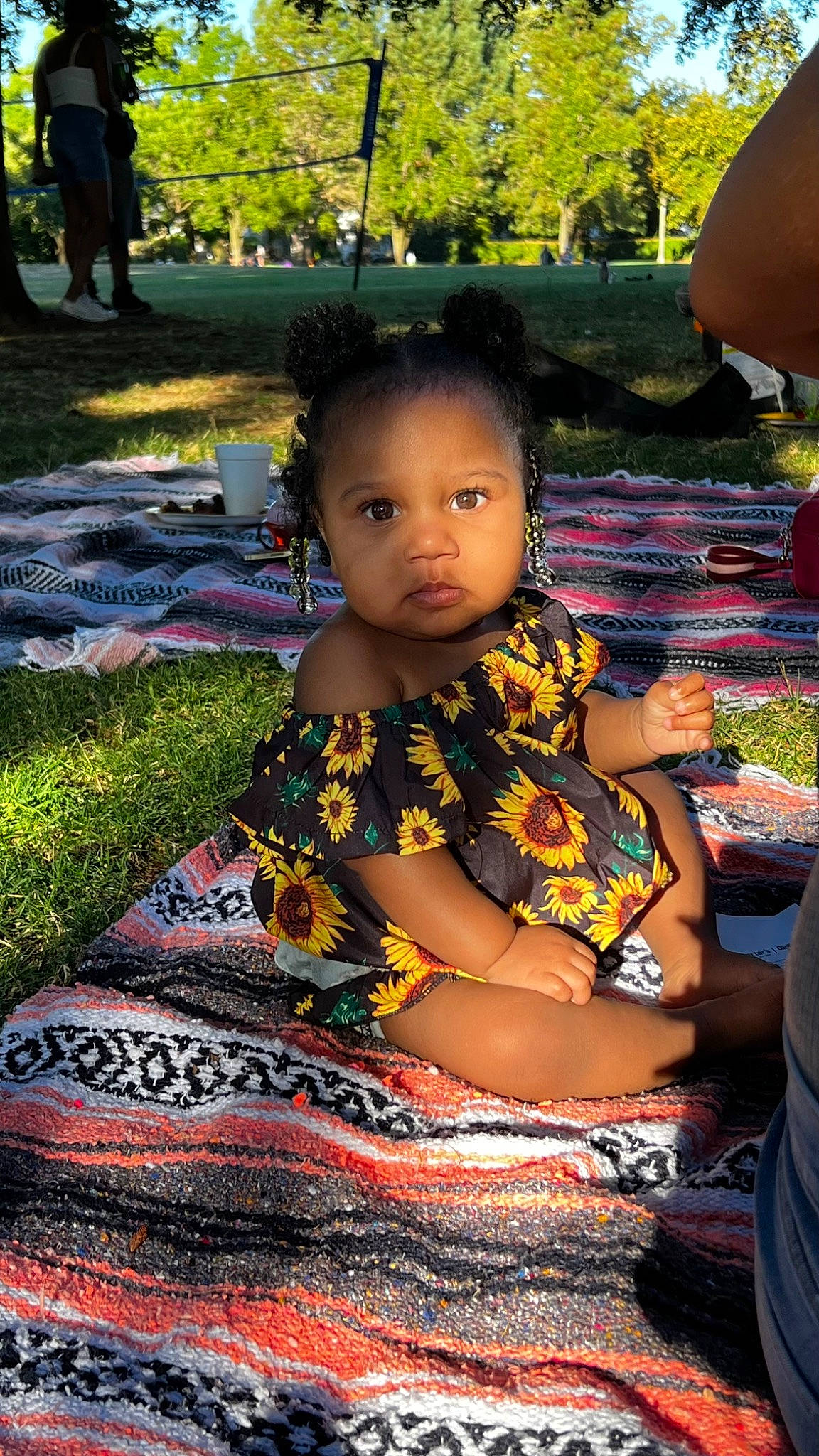 Kaliyah is registered to the contest to win money with this photo: adaptation, child, event, fun, grass, happy, leisure, morning, nature, pattern, people, person, plant, play, public_space, recreation, sitting, tints_and_shades, toddler, tradition