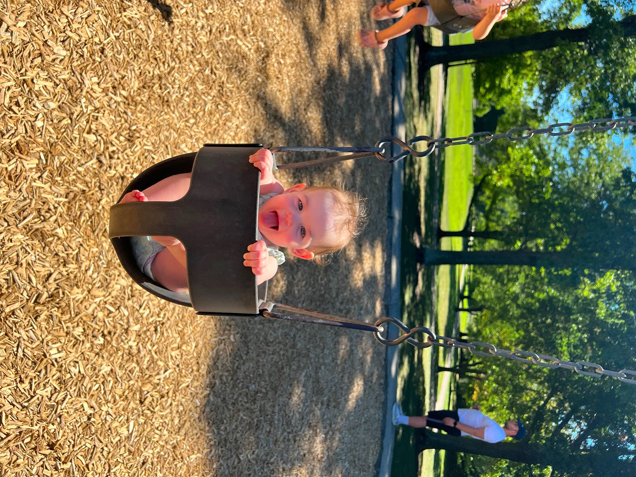 Ember is registered to the contest to win money with this photo: automotive_exterior, automotive_lighting, bumper, car, fun, grass, leisure, person, plant, recreation, shadow, soil, tints_and_shades, tire, toddler, toy, tree, vehicle, vehicle_door, wheel