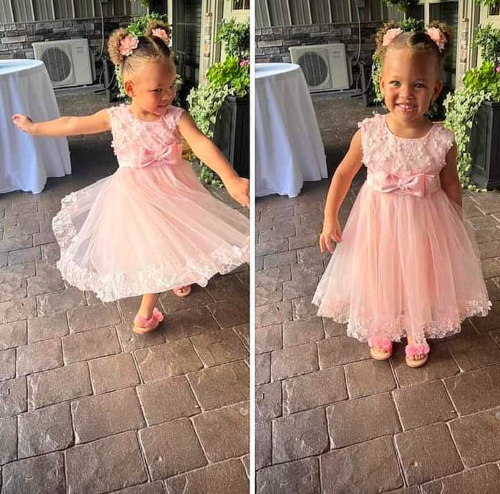 Kaloni joined the competition — help win amazing prizes! baby_toddler_clothing, bridal_party_dress, child, clothing, day_dress, dress, embellishment, event, flooring, formal_wear, happy, iris, joy, pattern, person, petal, photograph, pink, plant, skin