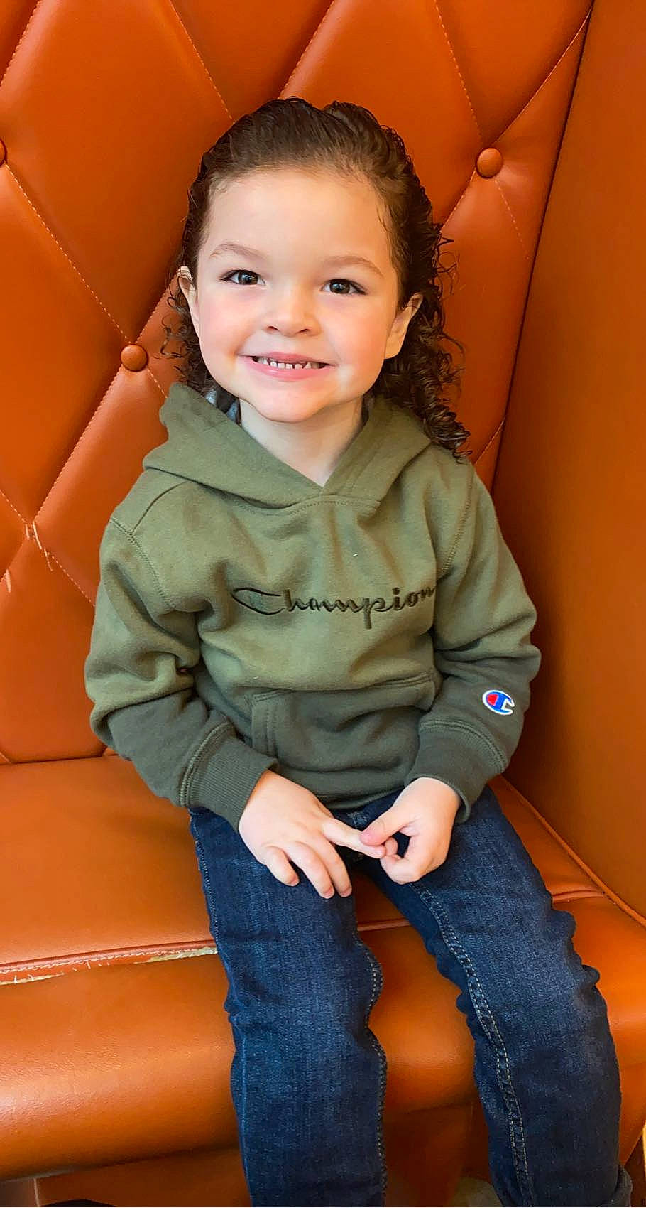 River is registered to the contest to win money with this photo: baby_toddler_clothing, cheek, child, chin, comfort, flash_photography, fun, happy, head, human_body, jeans, joy, knee, lap, lip, nose, person, skin, sleeve, smile