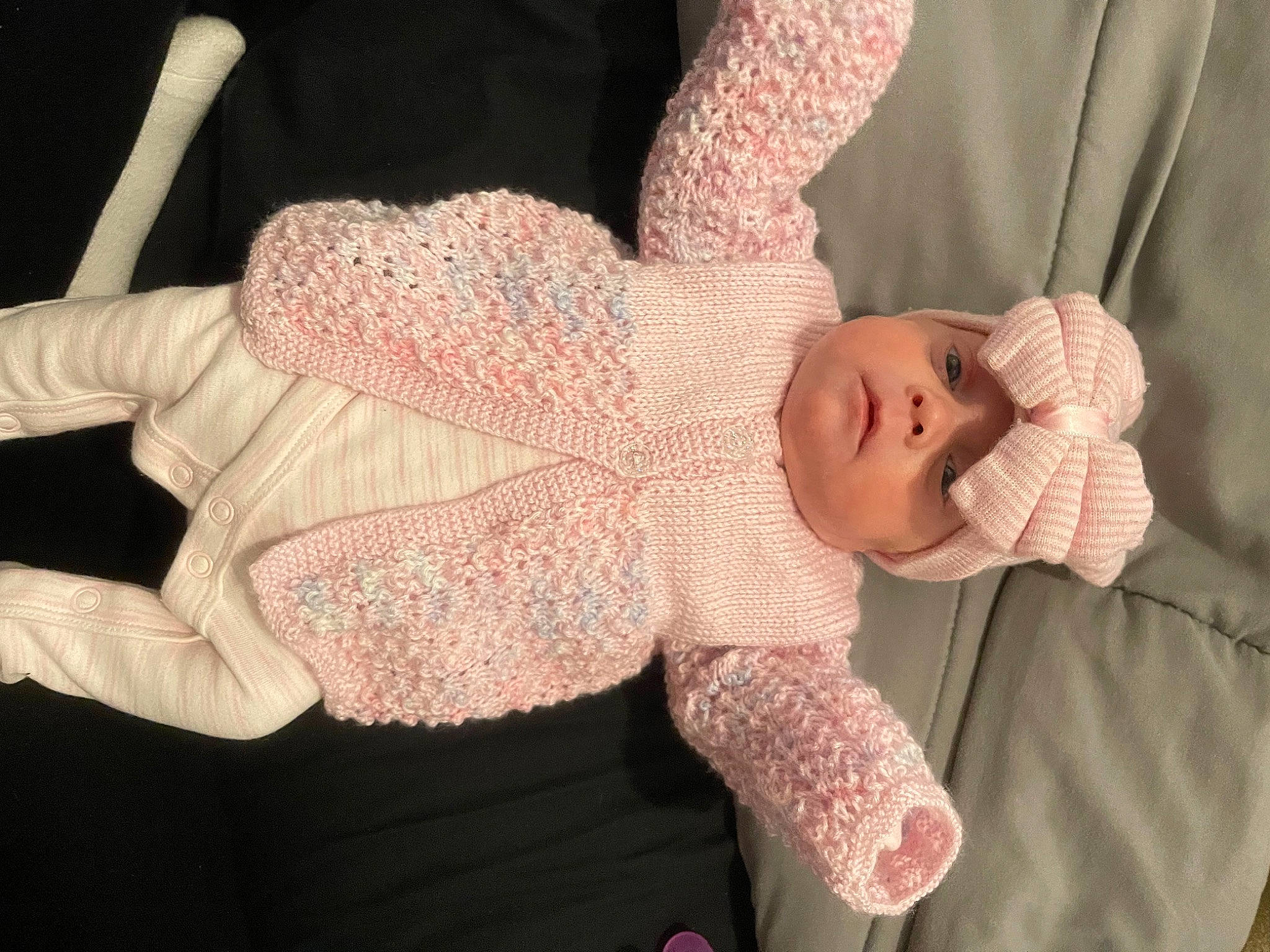 Bambi joined the competition — help win amazing prizes! baby, baby_products, baby_toddler_clothing, child, fashion_accessory, finger, gesture, hand, headgear, headwear, nail, pattern, peach, person, pink, sleeve, textile, thumb, toddler, wool