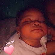 Cimani joined the competition — help win amazing prizes! baby, sleeping, infant, white_clothing, bear_design, heart_icon, text_overlay, closeup, soft_lighting, indoors, child, peaceful, portrait, cute, nighttime, relaxation, person, skin, small_child, cozy