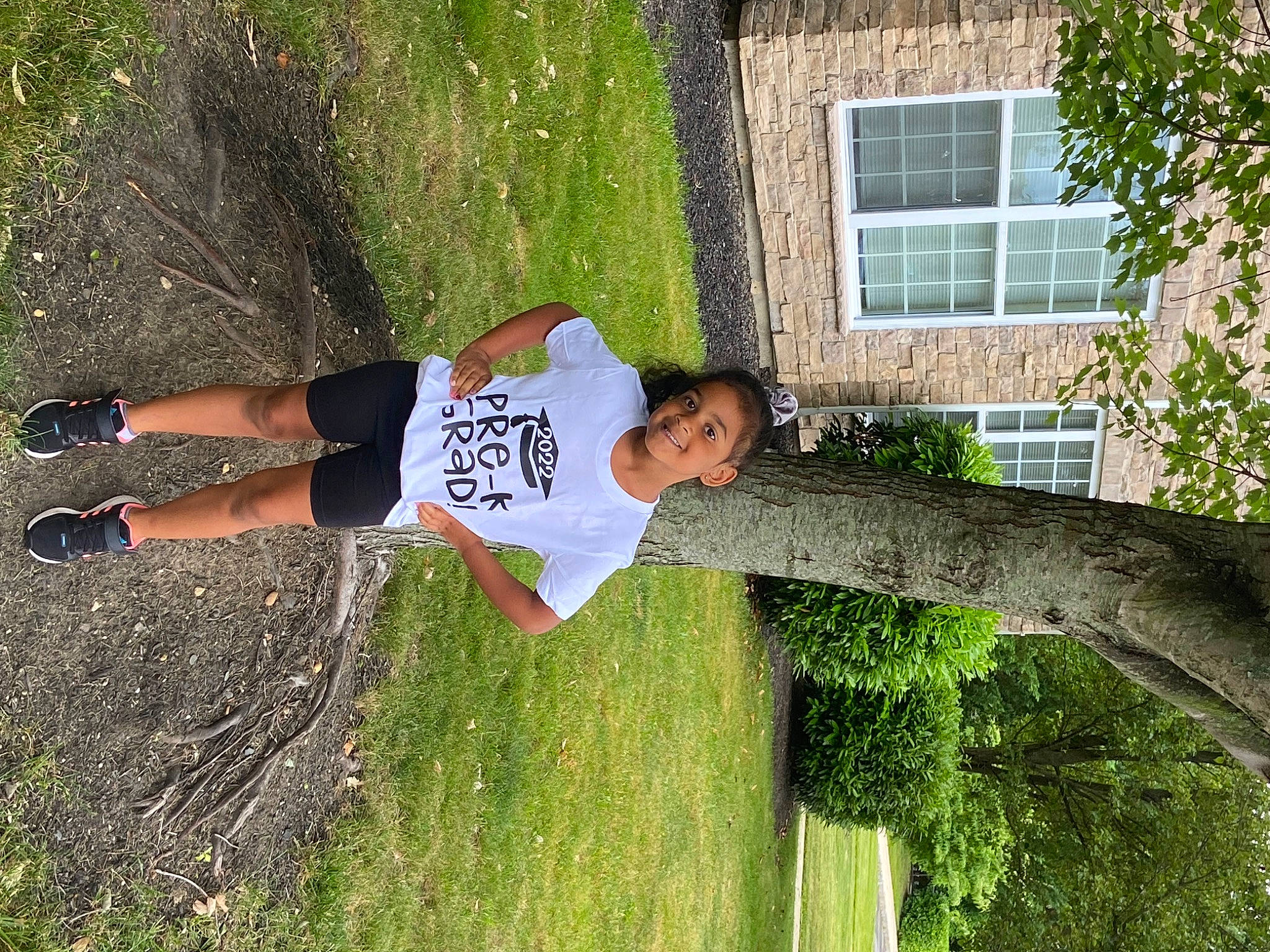 Khloe joined the competition — help win amazing prizes! fun, grass, happy, human_leg, joy, leisure, people_in_nature, person, plant, recreation, shorts, shrub, soil, sports_uniform, t_shirt, thigh, tree, trunk, window, yard