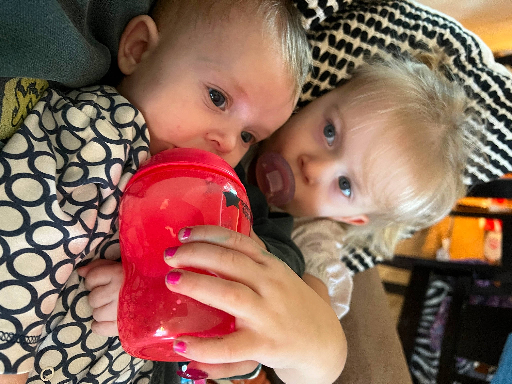 Rogue is registered to the contest to win money with this photo: baby, baby_products, baby_toddler_clothing, chair, cheek, child, comfort, dress, drinkware, finger, fun, happy, iris, lip, mouth, nail, nose, organ, person, skin