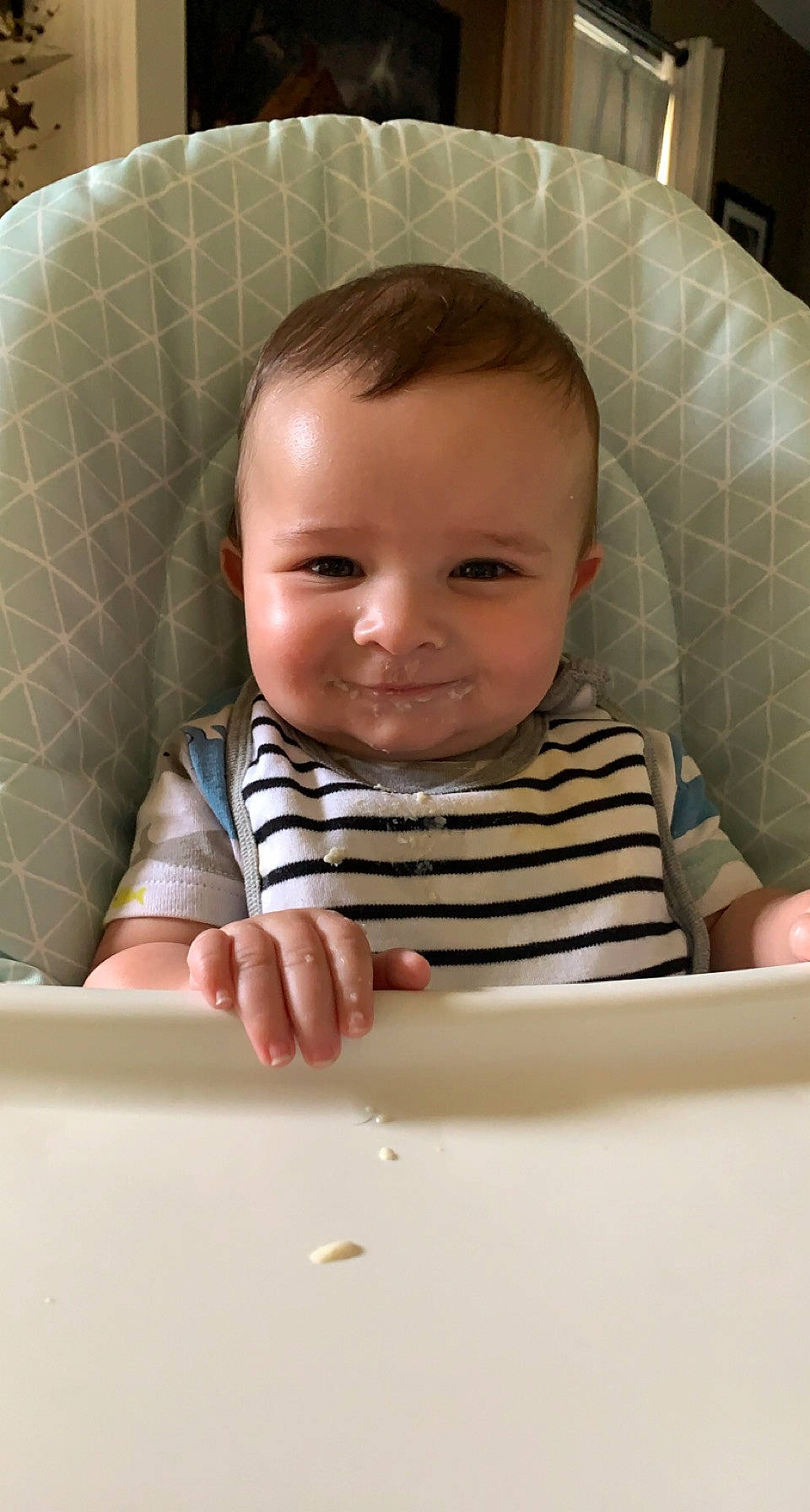 Carson is registered to the contest to win money with this photo: baby, baby_grabbing_for_something, baby_toddler_clothing, beauty, cheek, child, chin, comfort, face, facial_expression, fun, hair, joy, mouth, nose, person, product, sitting, skin, sleeve