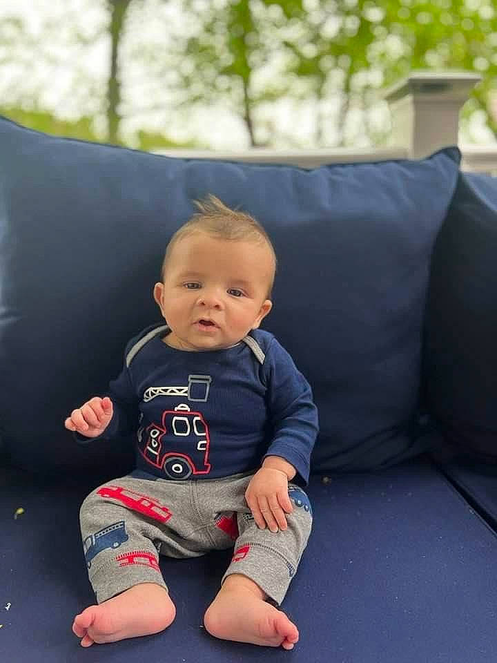 Carson joined the competition — help win amazing prizes! baby, baby_toddler_clothing, barefoot, child, comfort, couch, eye, flooring, foot, fun, grass, human_leg, knee, leisure, person, sitting, sleeve, t_shirt, thigh, toddler