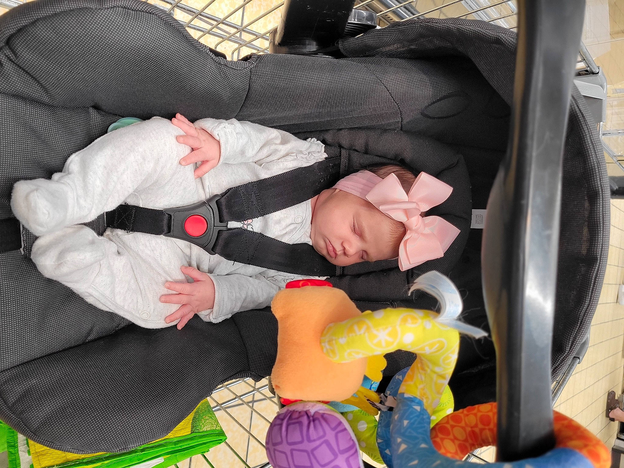 Sophie joined the competition — help win amazing prizes! baby_products, car_seat, carmine, comfort, headwear, lap, person, plastic, product, sitting, stuffed_toy, textile, toy