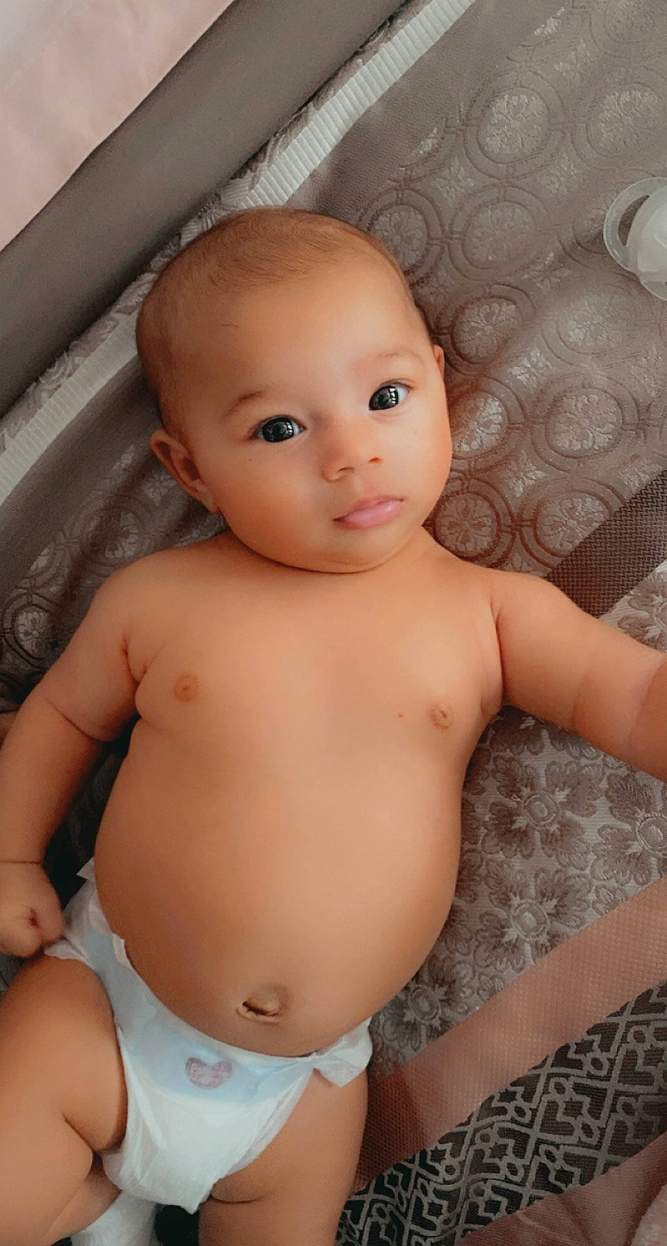 Sahara is registered to the contest to win money with this photo: baby, cheek, chest, chin, eye, eyebrow, eyelash, forehead, head, human_body, iris, joint, leg, lip, mouth, neck, nose, person, shoulder, skin