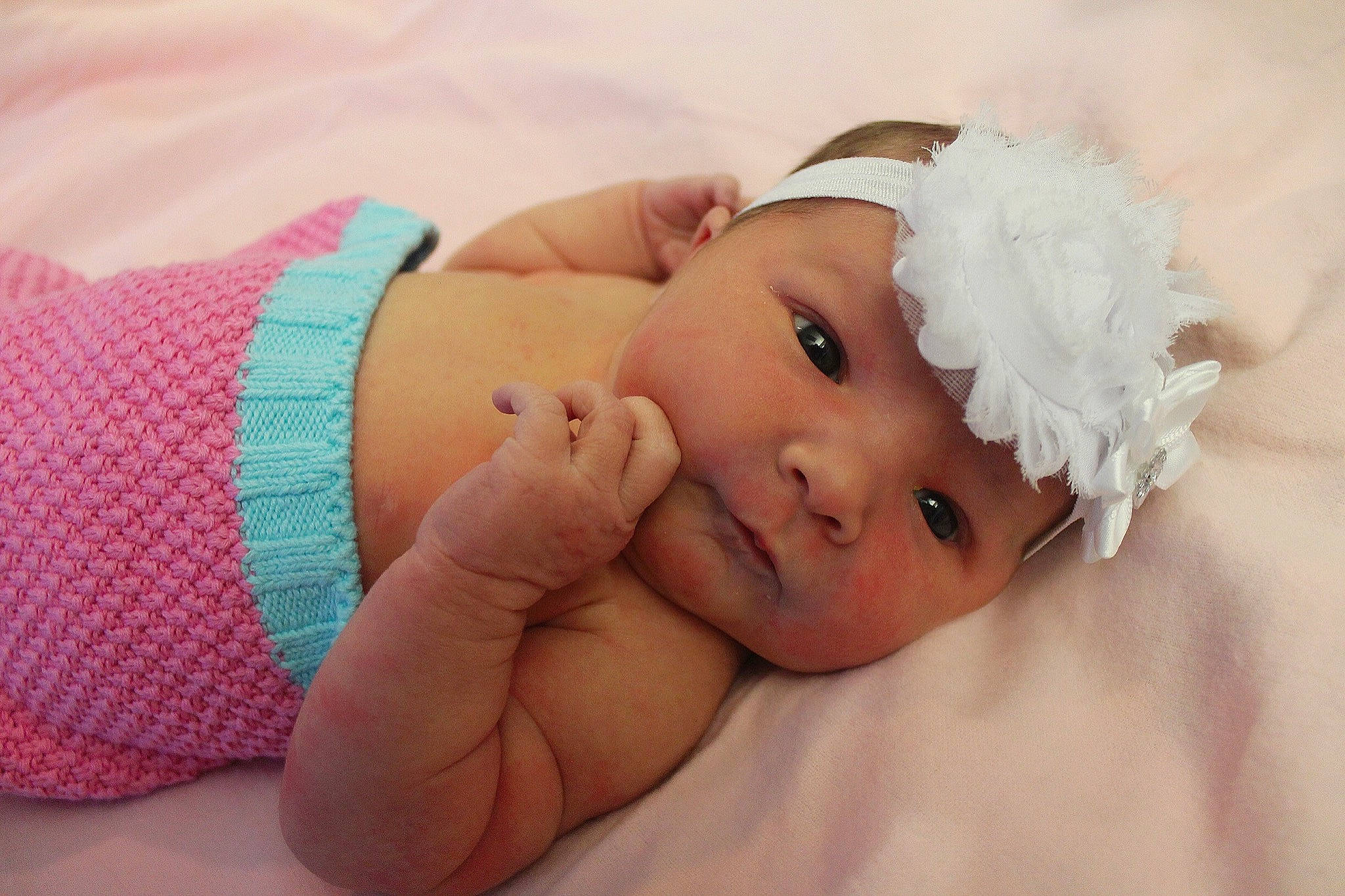 Scarlett joined the competition — help win amazing prizes! baby, cheek, child, close_up, eye, face, fashion_accessory, hair_accessory, hand, head, headband, headgear, headwear, lip, mouth, nose, person, photography, pink, product