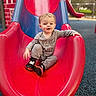 Luxxon is registered to the contest to win money with this photo: blue, casual, child, clothing, daytime, fun, happy, outdoor, park, person, play, playground, red, shoes, sitting, slide, smiling, toddler, toy, young