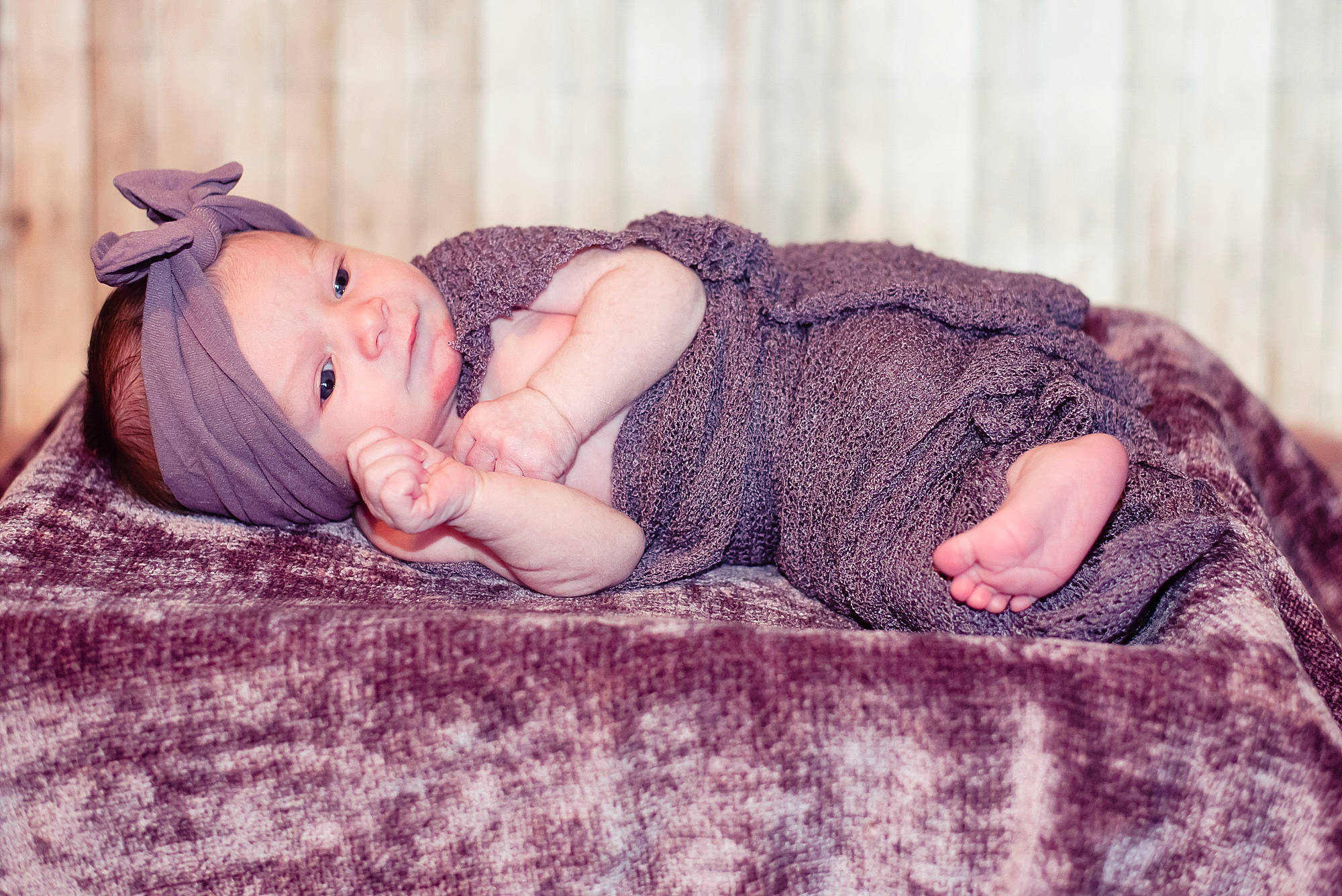 Haizley is registered to the contest to win money with this photo: baby, child, comfort, fashion_accessory, flash_photography, flooring, fur, grass, happy, headpiece, knit_cap, linens, magenta, pattern, person, pink, purple, sitting, skin, toddler