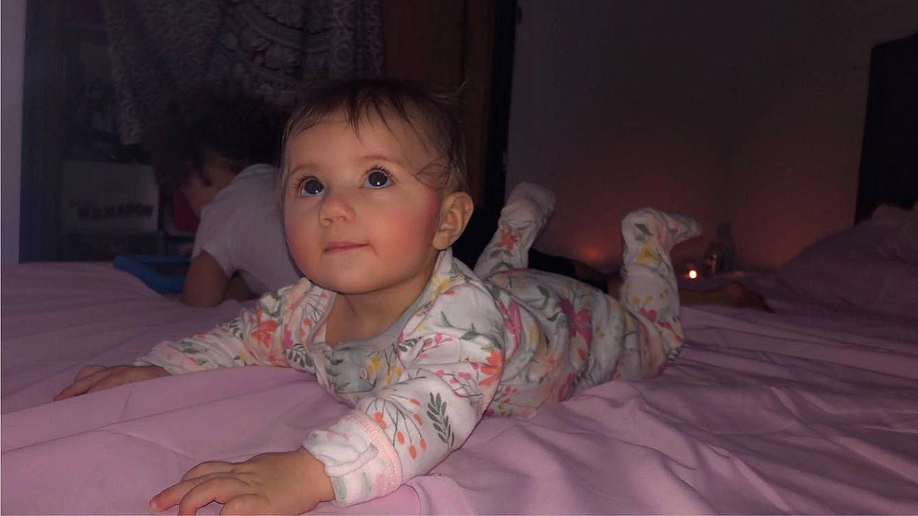 Kaliyah joined the competition — help win amazing prizes! baby, baby_toddler_clothing, cheek, child, comfort, crawling, eyebrow, finger, flash_photography, floor, flooring, fun, iris, linens, mouth, nose, person, skin, toddler, tummy_time