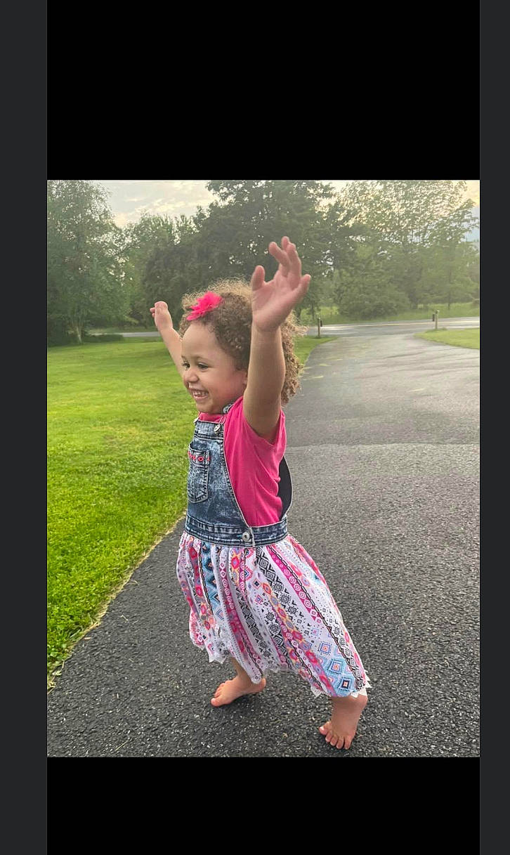 Jenamiah is registered to the contest to win money with this photo: child, flash_photography, fun, gesture, grass, grassland, happy, joy, leisure, magenta, pattern, people_in_nature, person, pink, plant, sleeve, smile, t_shirt, tints_and_shades, toddler