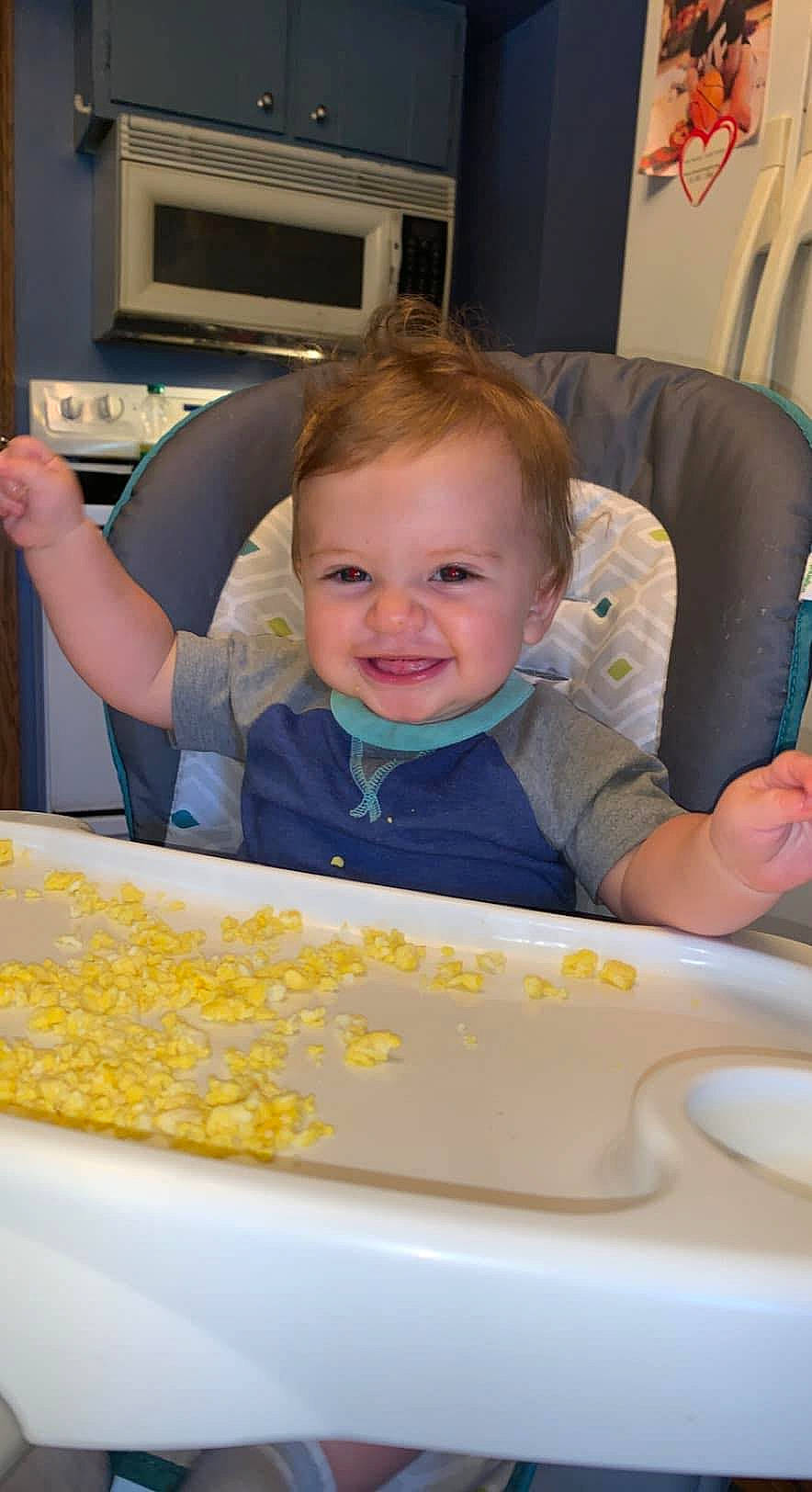 Kylar joined the competition — help win amazing prizes! baby, baby_toddler_clothing, chair, child, comfort, comfort_food, cuisine, dish, food, fun, home_appliance, joy, person, plate, room, sitting, smile, t_shirt, tableware, television