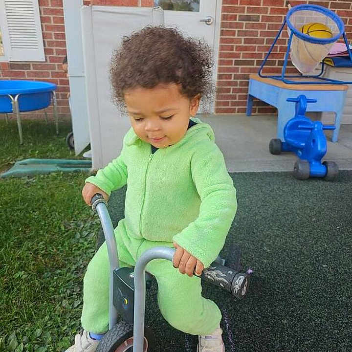 Raiden joined the competition — help win amazing prizes! boy, child, clothing, coat, face, footwear, grass, head, male, outdoors, pants, person, photography, plant, playarea, portrait, shoe, transportation, tricycle, vehicle
