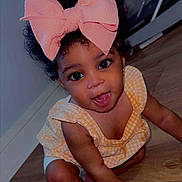 Promise joined the competition — help win amazing prizes! toddler, child, baby, bow, curly_hair, yellow_dress, crawling, floor, indoors, smiling, happy, cute, portrait, skin, eyes, hand, legs, infant, head, person