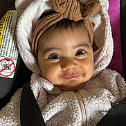 Lilia joined the competition — help win amazing prizes! baby, child, smiling, headband, ears, pink, jacket, car_seat, straps, closeup, face, infant, cute, happy, indoors, person, portrait, clothing, young, child_safety