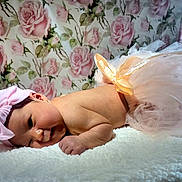 Syanna joined the competition — help win amazing prizes! baby, newborn, infant, bow, headband, tutu, ribbon, blanket, floral_wallpaper, rose_pattern, soft_texture, sleeping, cute, portrait, child, skin, pink, peach, lying_down, indoors