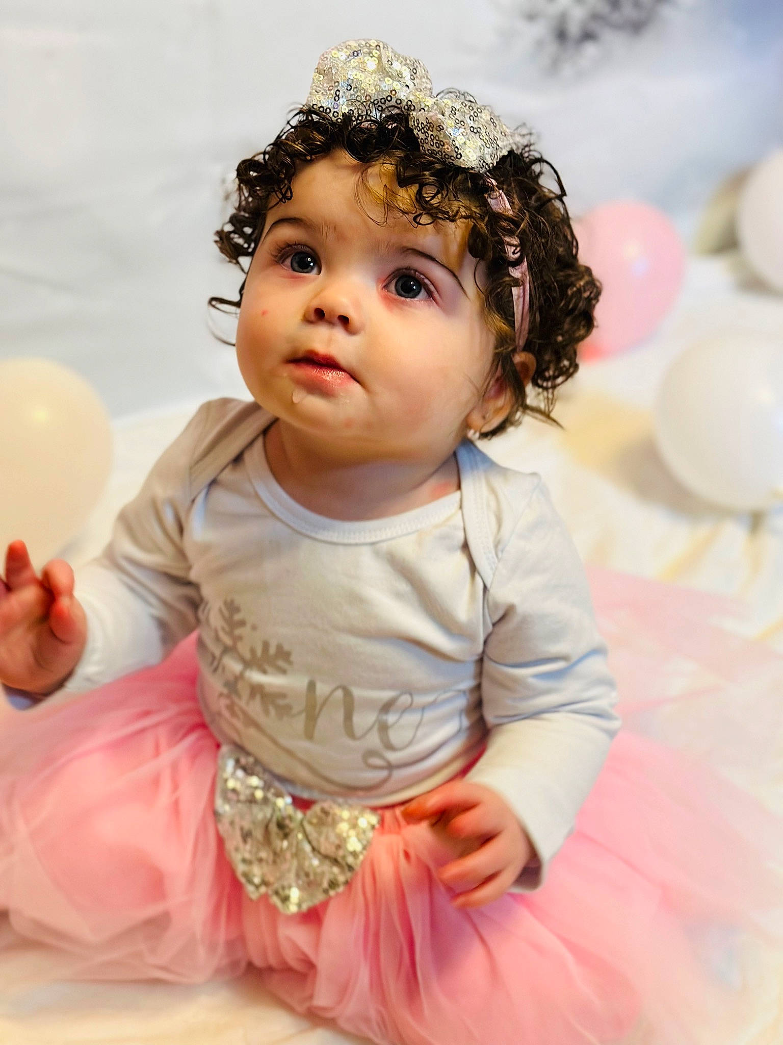 Harper is registered to the contest to win money with this photo: baby, baby_toddler_clothing, balloon, cheek, child, face, finger, flash_photography, fun, gesture, hairstyle, happy, head, iris, lip, person, pink, skin, sleeve, toddler