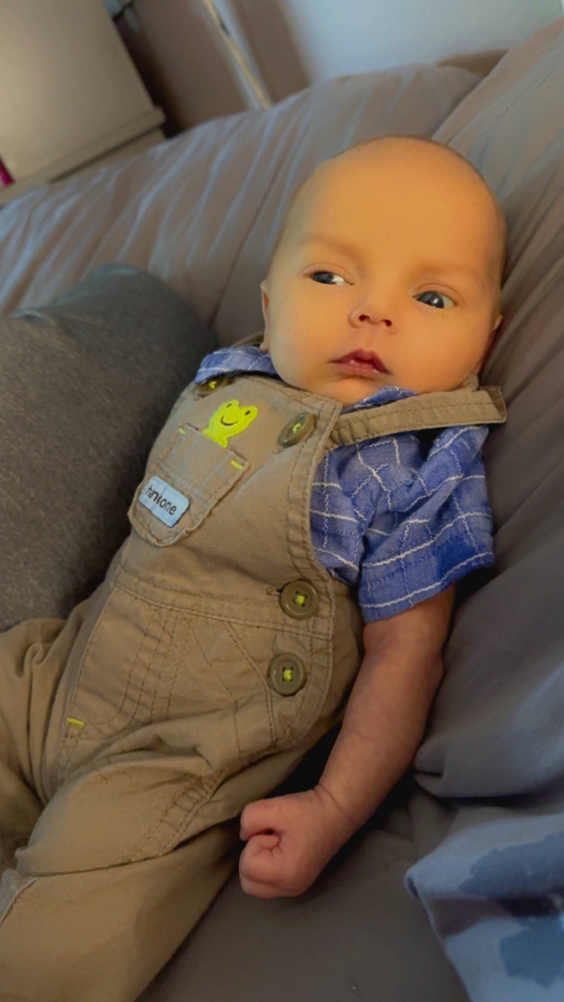 Maddox is registered to the contest to win money with this photo: baby, baby_in_car_seat, baby_products, baby_toddler_clothing, car_seat, cheek, child, collar, comfort, electric_blue, face, gesture, human_body, linens, outerwear, person, sitting, skin, sleeve, thumb