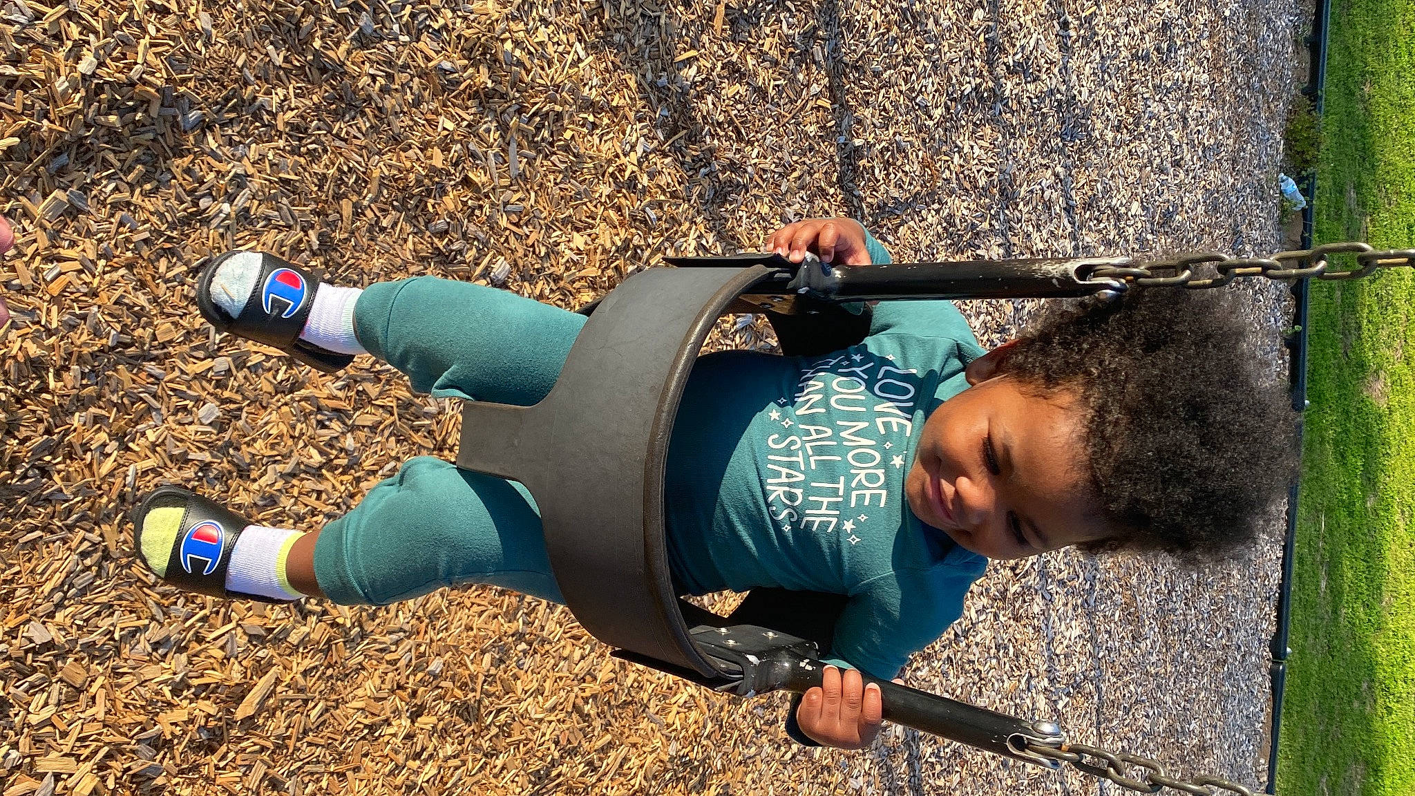 Ariyah is registered to the contest to win money with this photo: child, electric_blue, fun, grass, human_leg, joy, knee, leisure, people_in_nature, person, physical_fitness, play, recreation, shadow, sitting, sneakers, soil, t_shirt, toddler, tree
