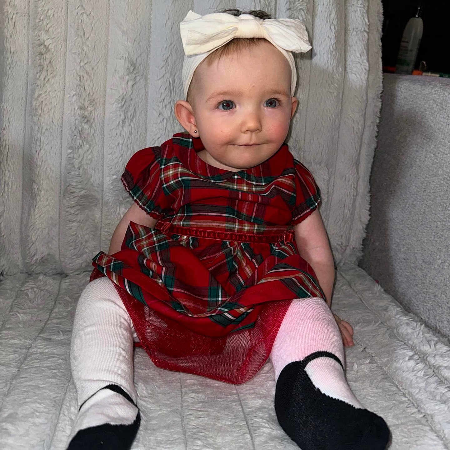 Mckenlee joined the competition — help win amazing prizes! baby, clothing, costume, couch, dress, face, footwear, furniture, hat, head, hosiery, indoors, pants, person, photography, portrait, shoe, sitting, sock, tartan