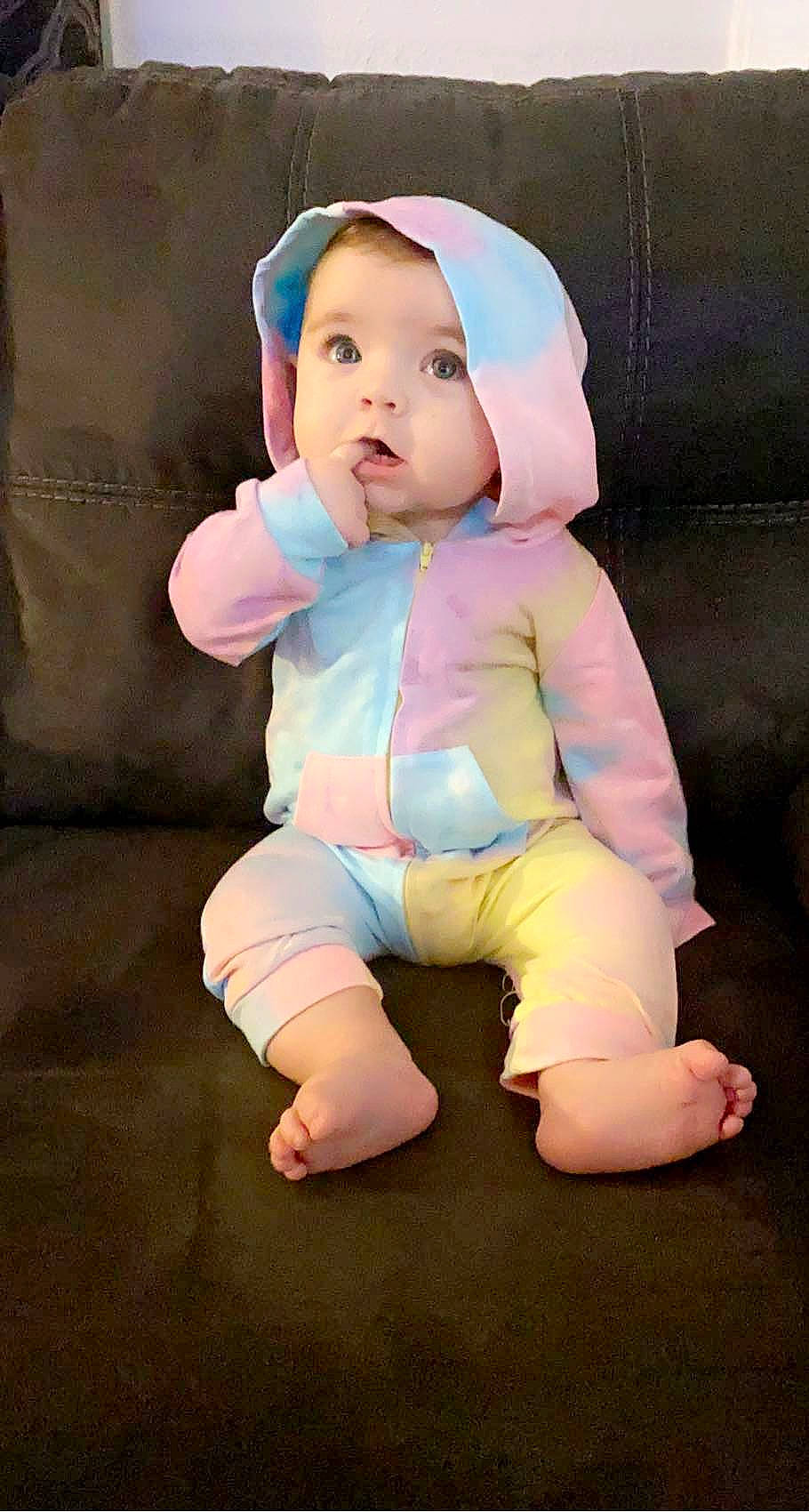 Ayva is registered to the contest to win money with this photo: baby, baby_toddler_clothing, carmine, cheek, child, comfort, costume, eye, face, foot, fur, head, human_leg, lap, person, pink, plush, sitting, sleeve, stuffed_toy