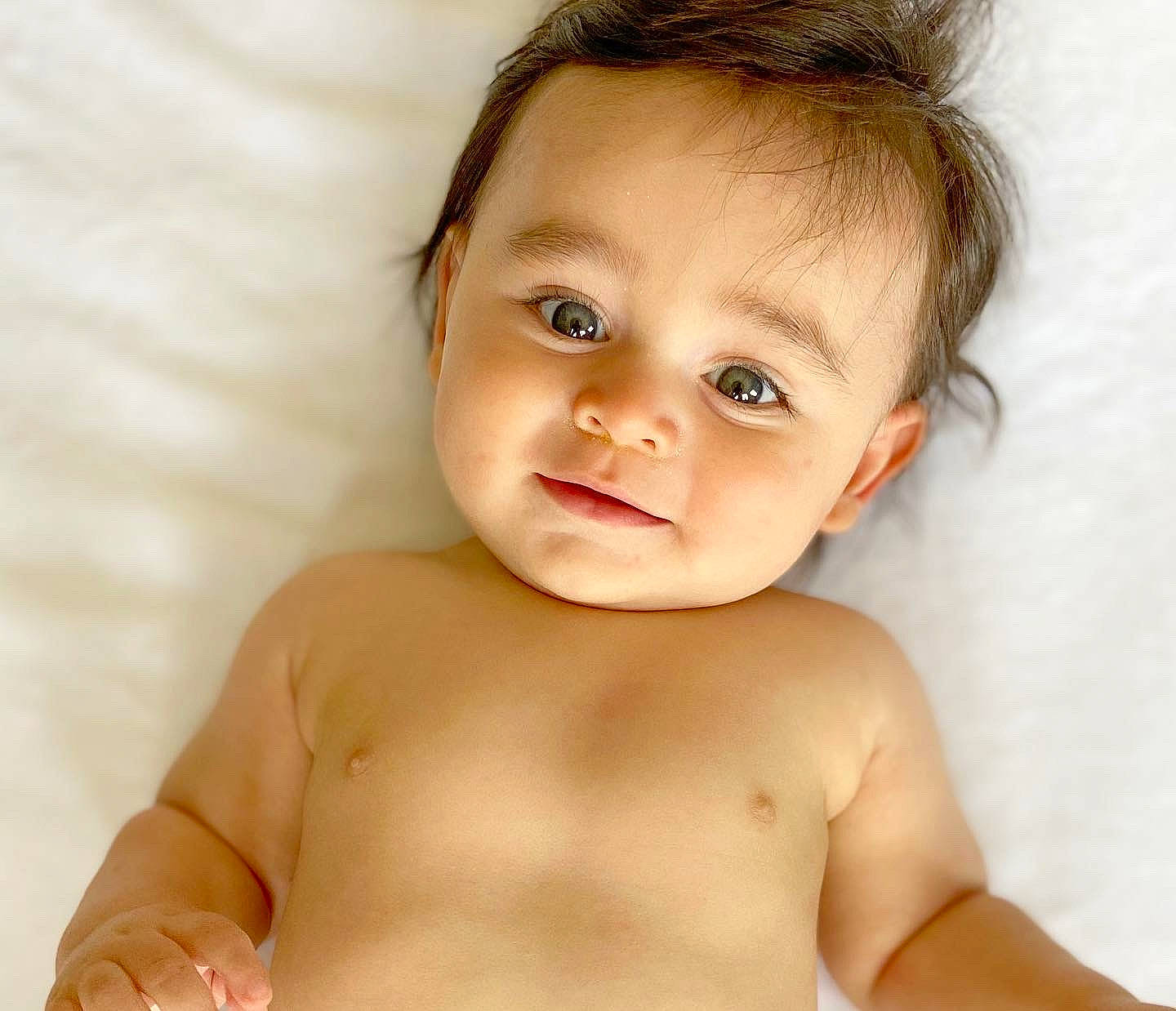Joaquín is registered to the contest to win money with this photo: baby, cheek, chest, chin, ear, eye, eyebrow, eyelash, face, hair, hairstyle, happy, iris, jaw, lip, no_expression, nose, person, skin, smile