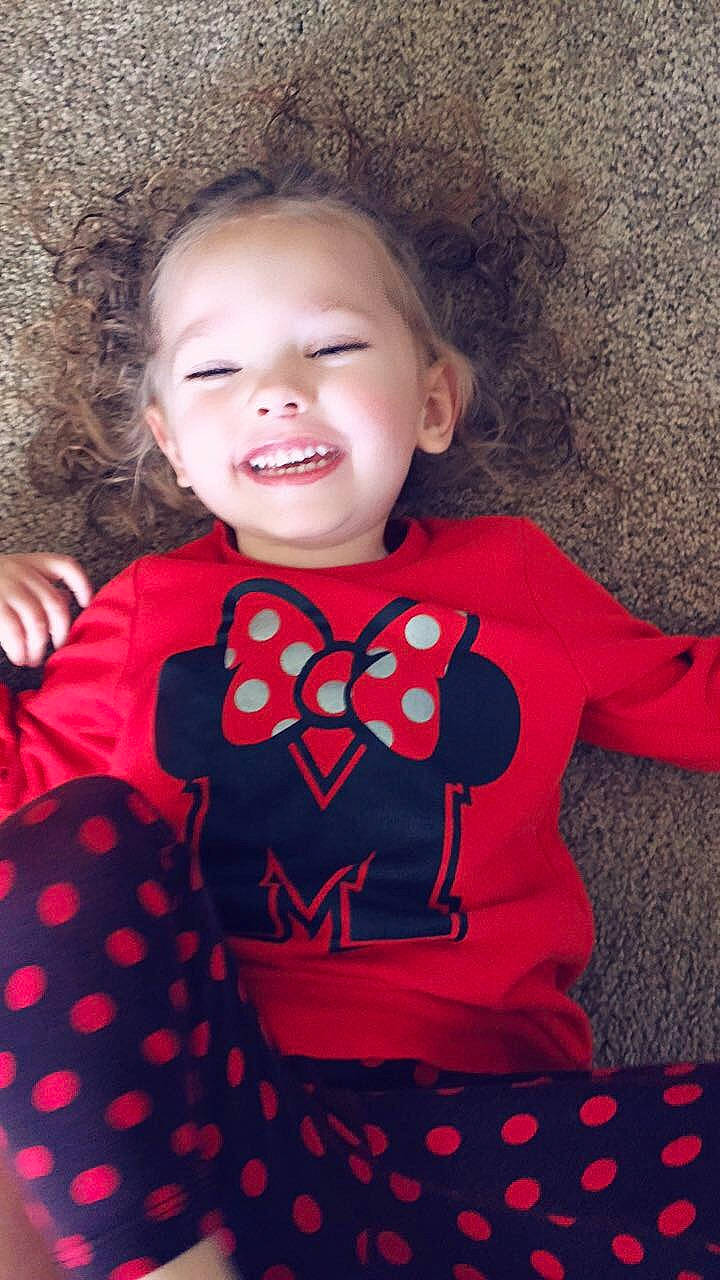 Kahlani is registered to the contest to win money with this photo: baby, baby_toddler_clothing, child, design, facial_expression, happy, joy, outerwear, pattern, person, play, polka_dot, red, smile, toddler